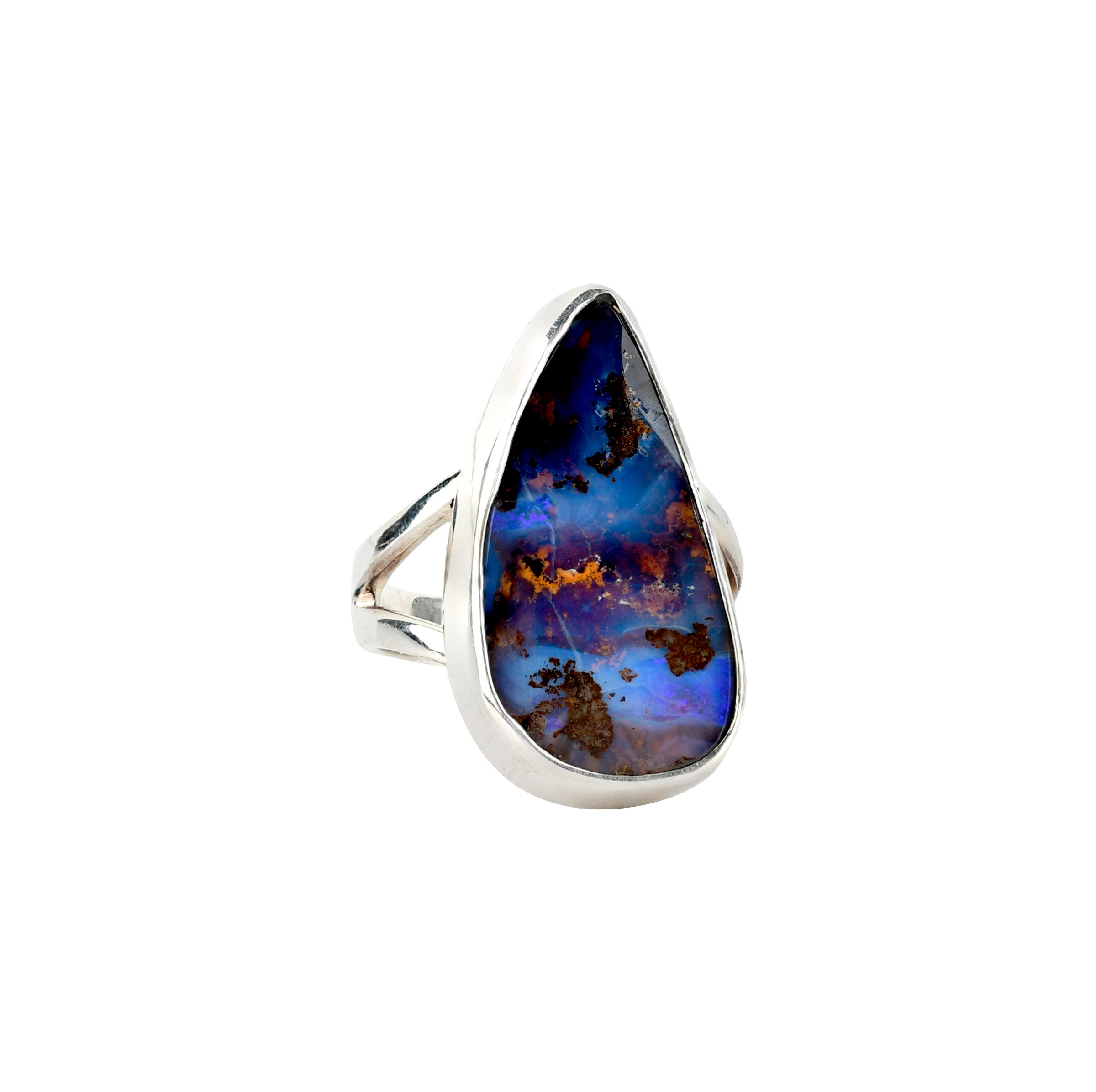 Sterling silver ring and bezel around teardrop shapped and conclaved australian boulder opal. 