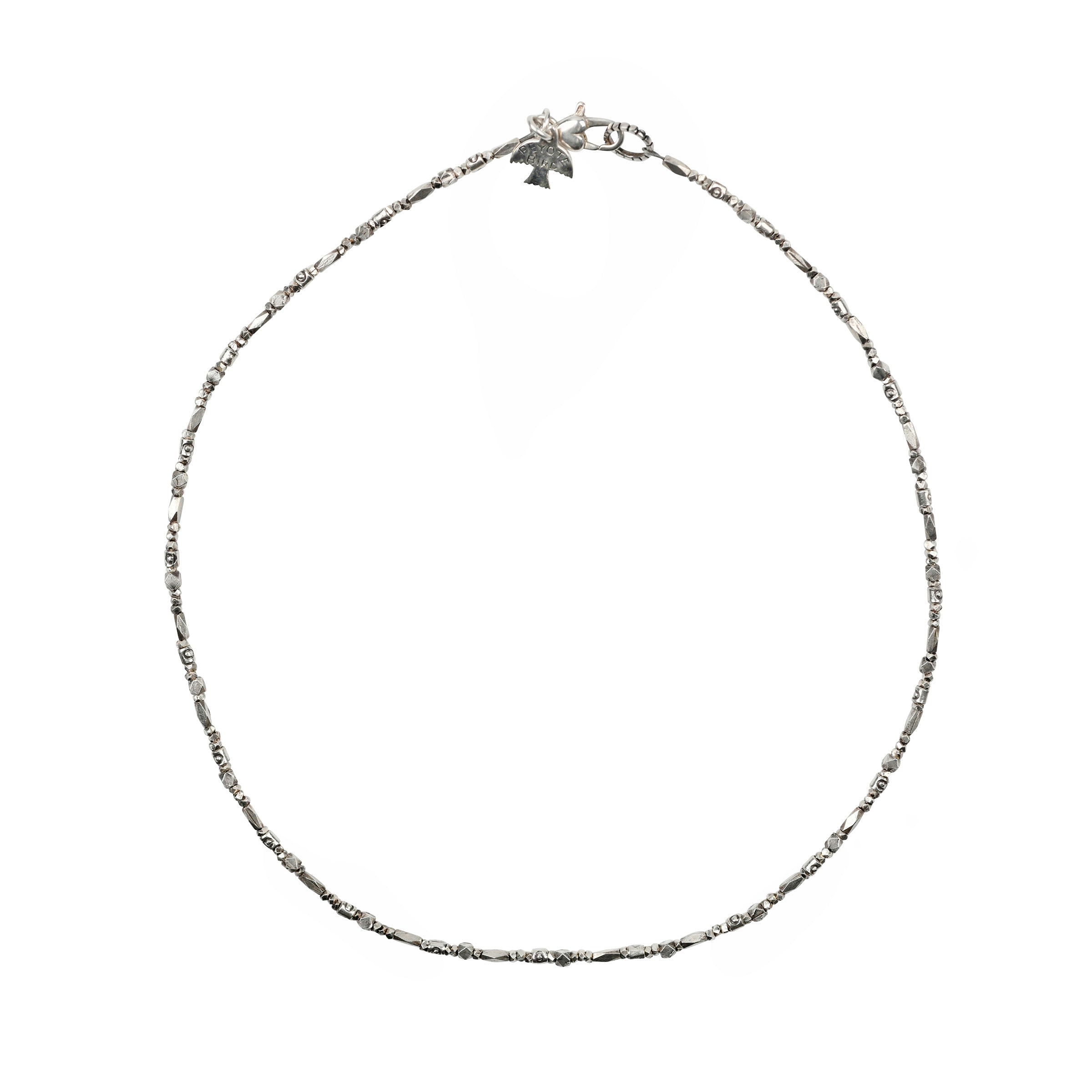 A simple beaded necklace meant for layering with other pieces. Strung with stamped Sterling Silver Thai beading and finished with a heart shaped lobster clasp
