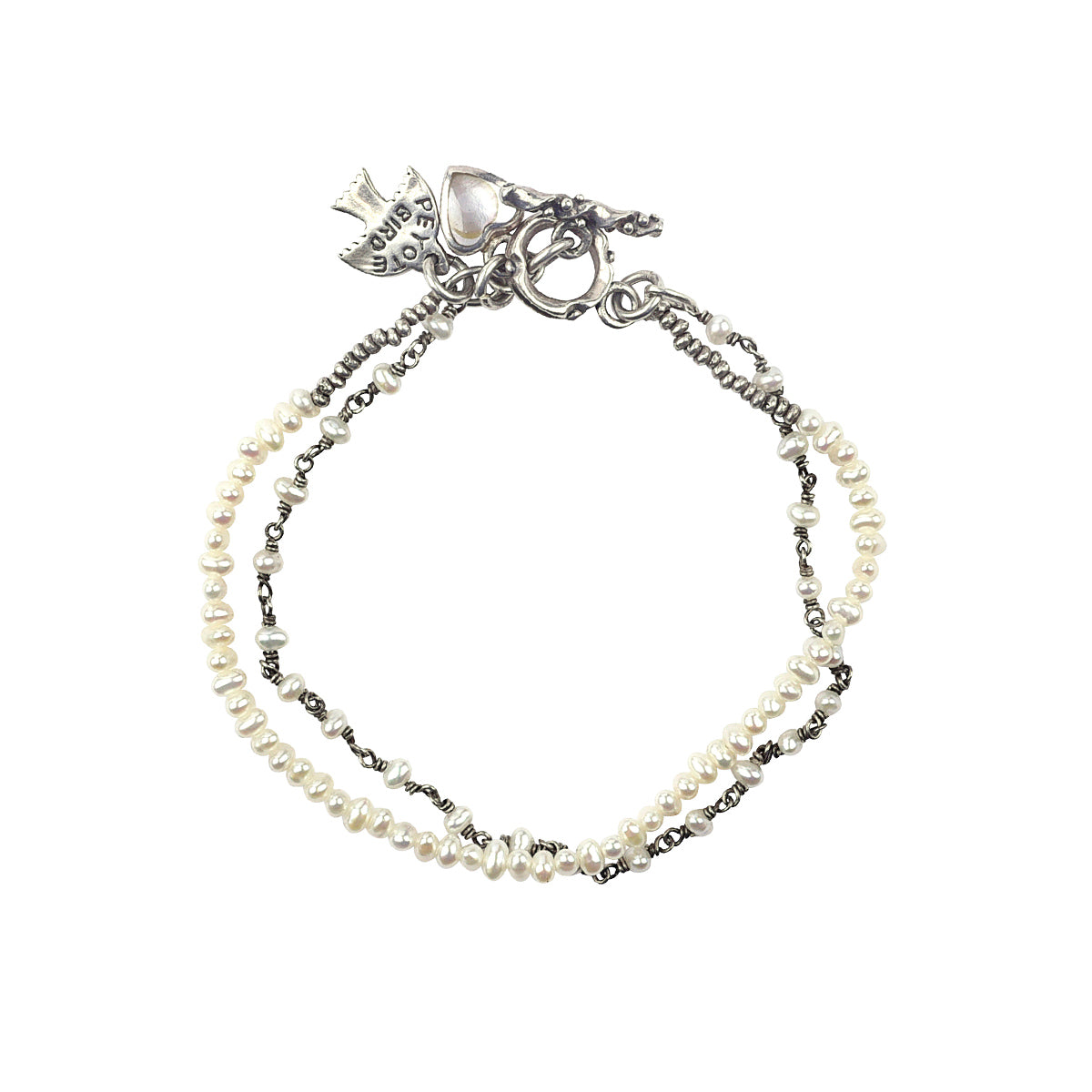 Two strand pearl bracelet with hear charm and toggle closure. 