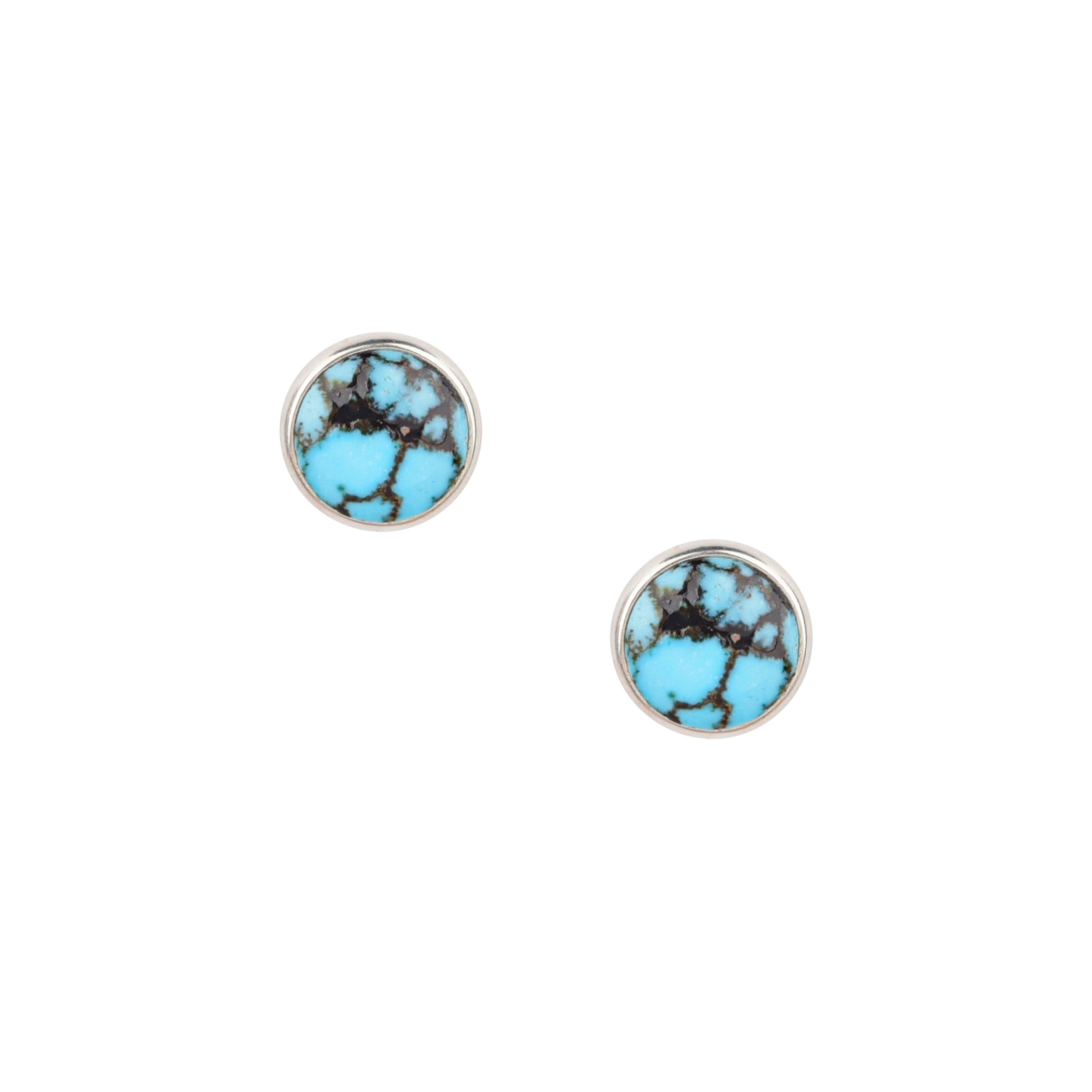 Dennis Hogan's Full Moon post earrings feature Sterling Silver and a variety of beautiful stone options. Vibrant shades of Turquoise and bold Jet black. These earrings are a great addition to any outfit or occasion. 