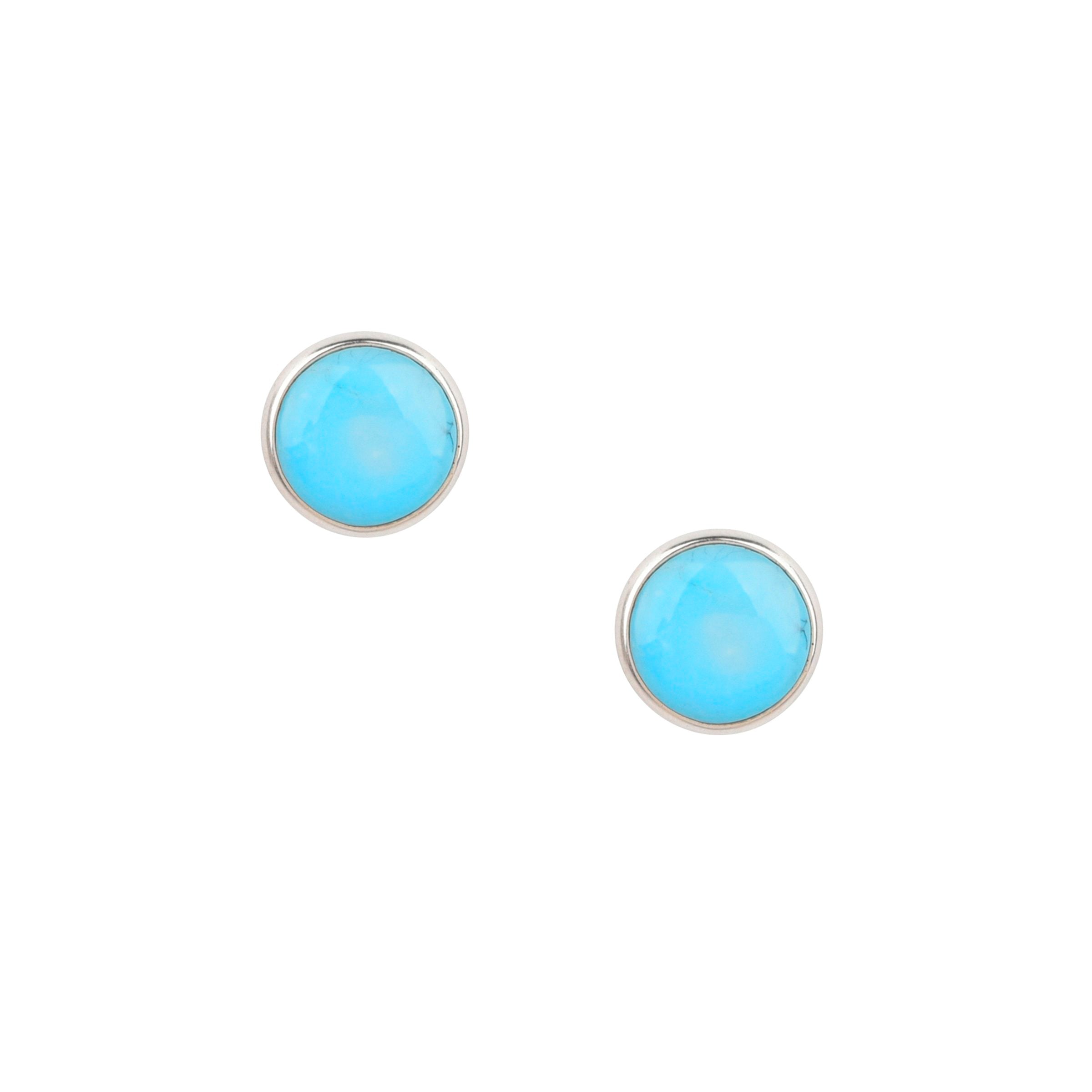 Dennis Hogan's Full Moon post earrings feature Sterling Silver and a variety of beautiful stone options. Vibrant shades of Turquoise and bold Jet black. These earrings are a great addition to any outfit or occasion. 