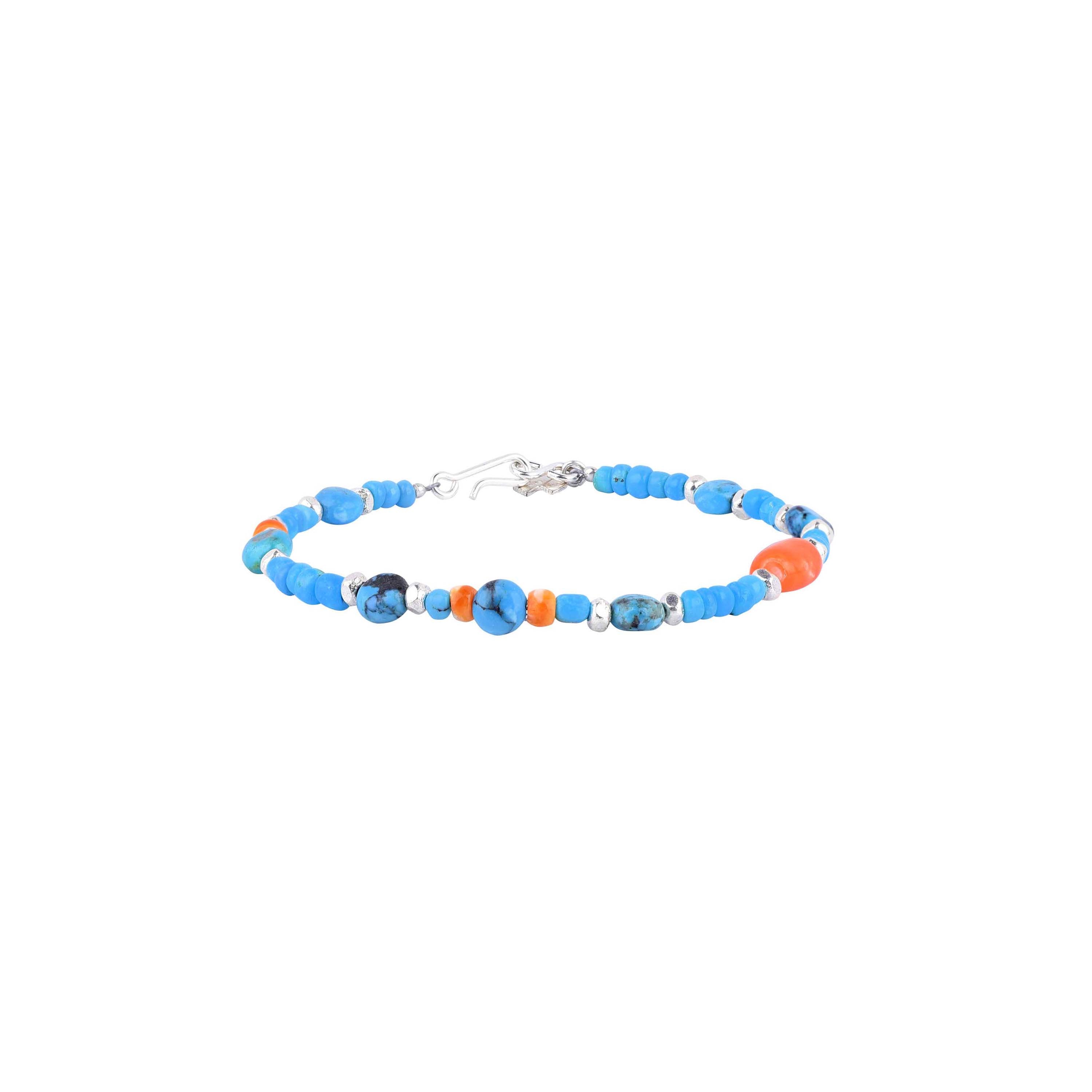 The Virgo bracelet features a combination of blue turquoise and orange spiny oyster shell beads, with silver accents on a silver chain. Peyote Bird original. Made in USA.