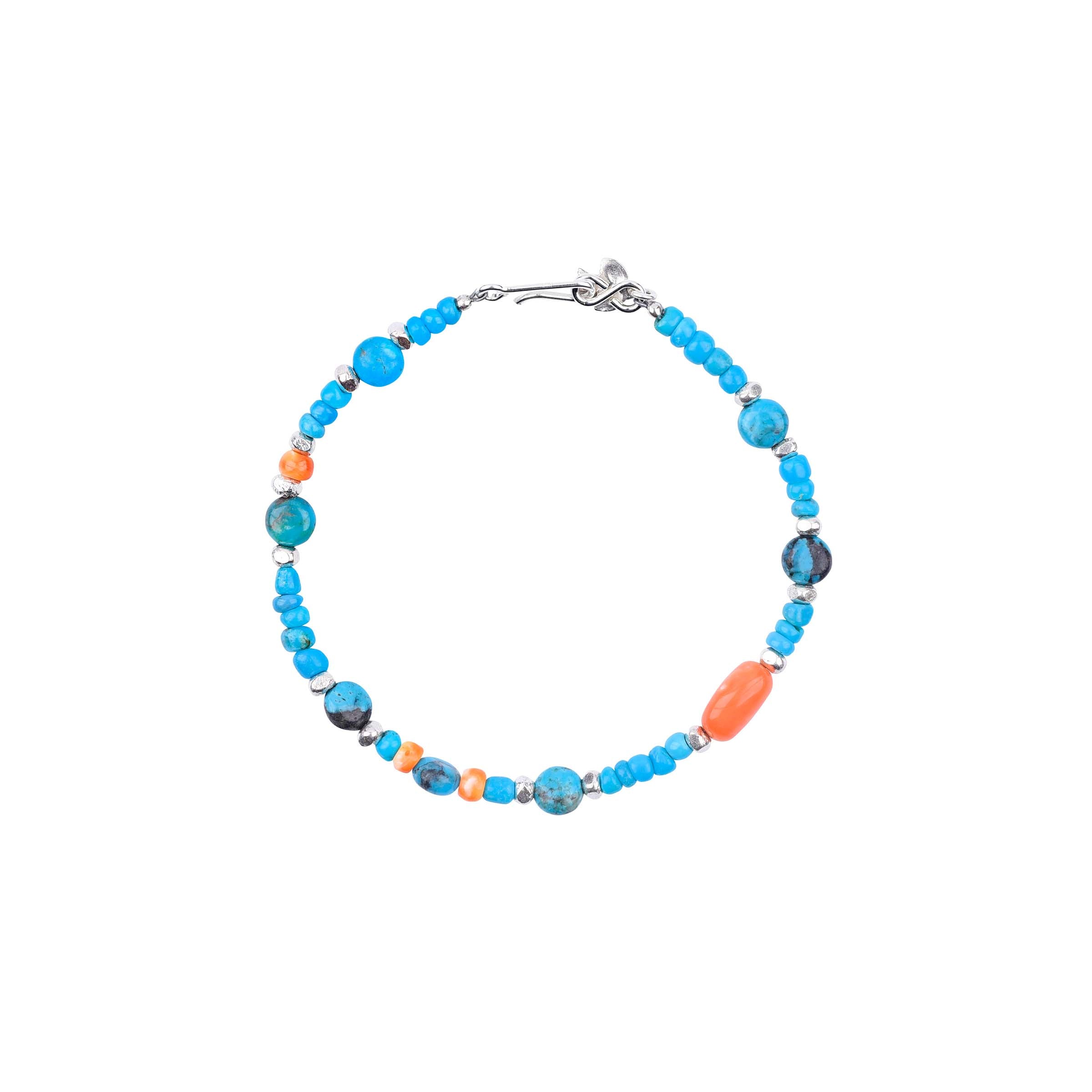 The Virgo bracelet features a combination of blue turquoise and orange spiny oyster shell beads, with silver accents on a silver chain. Peyote Bird original. Made in USA.