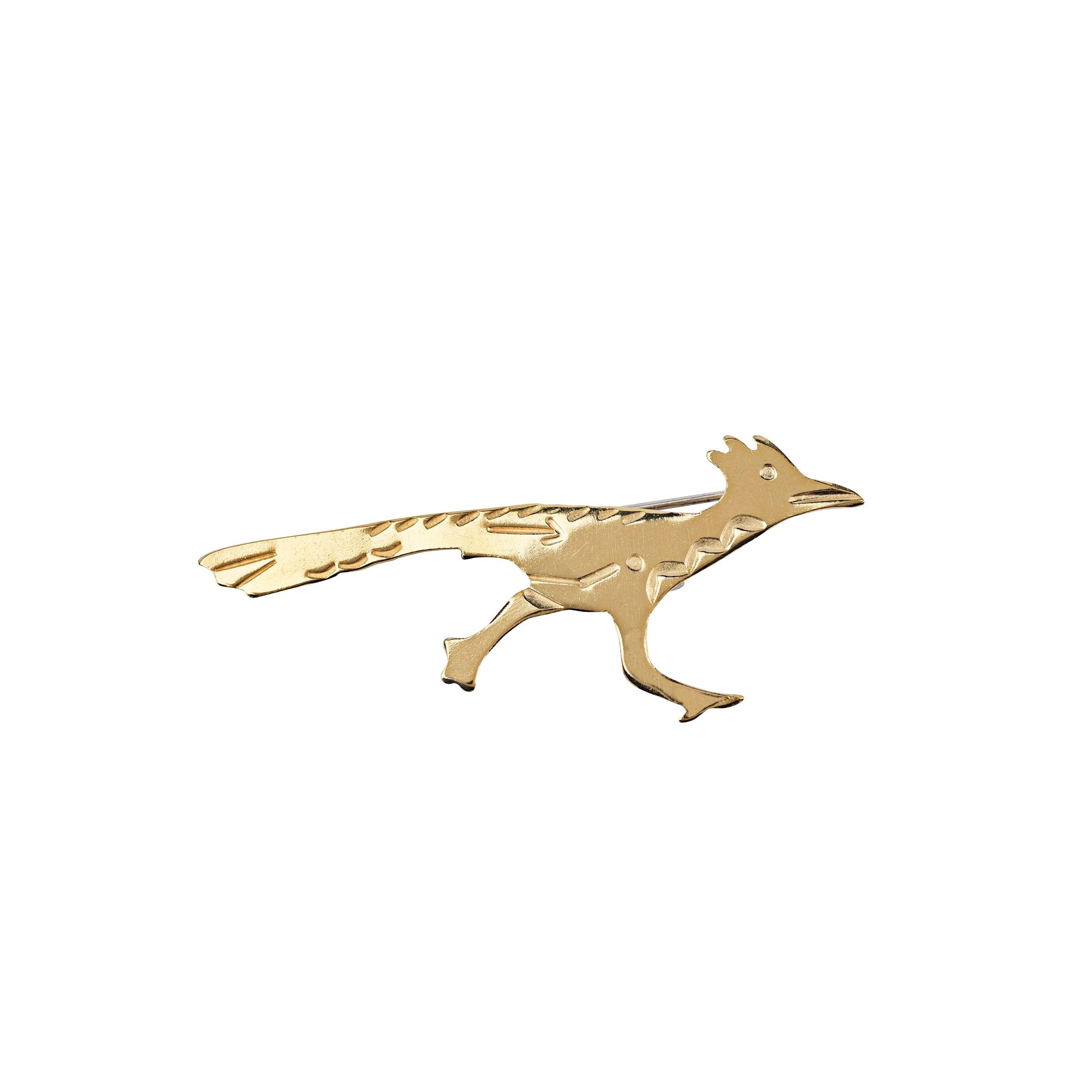 A handcrafted piece by Joe Eby, this stamped, sterling silver pin of a sweet roadrunner on the move is a great Southwestern addition to your collection. This pin has a bar back clasp for a secured look.