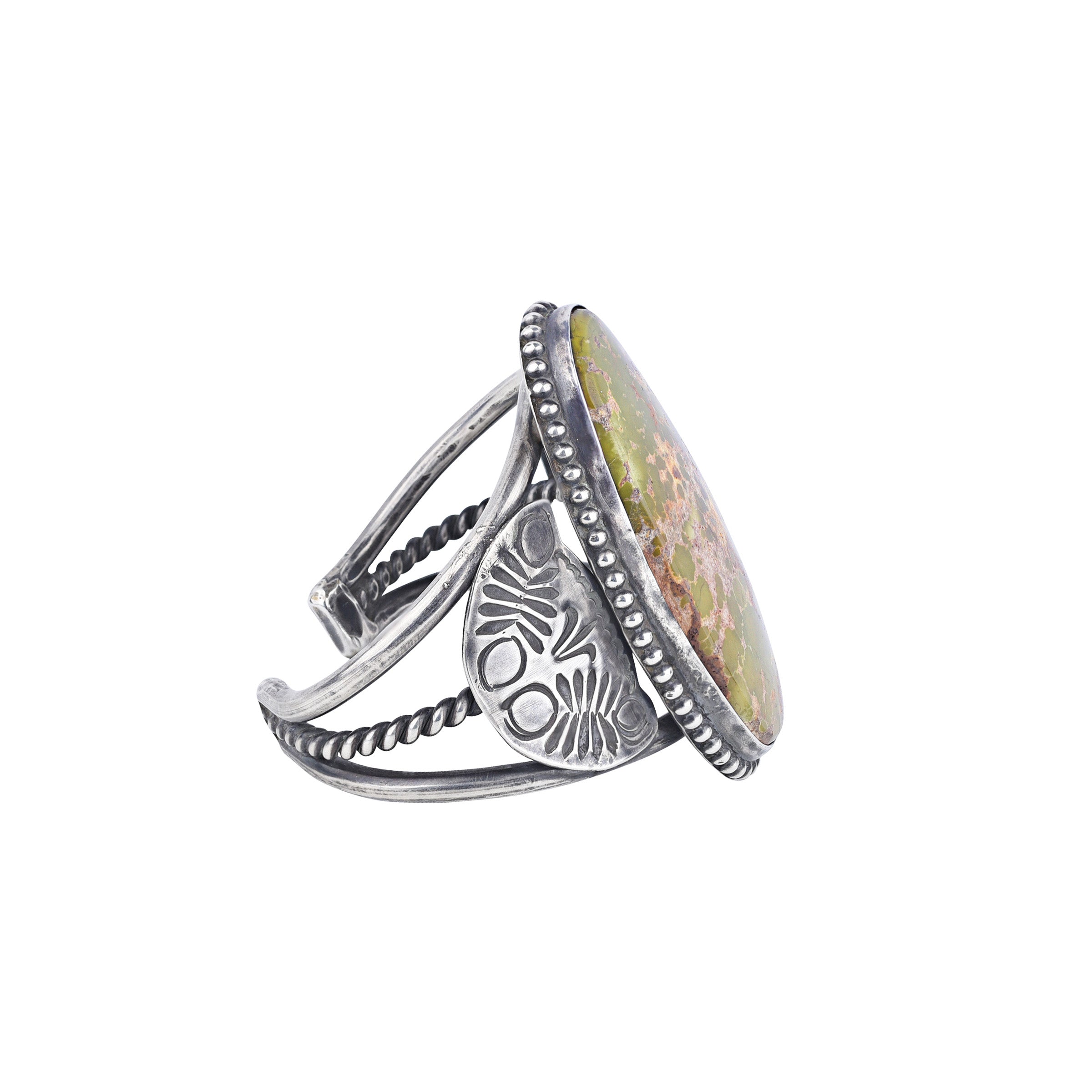 The Vintage Mesa Verde Cuff features Sterling Silver and a stunning Green Cerrillos Turquoise centerpiece. Made in USA.