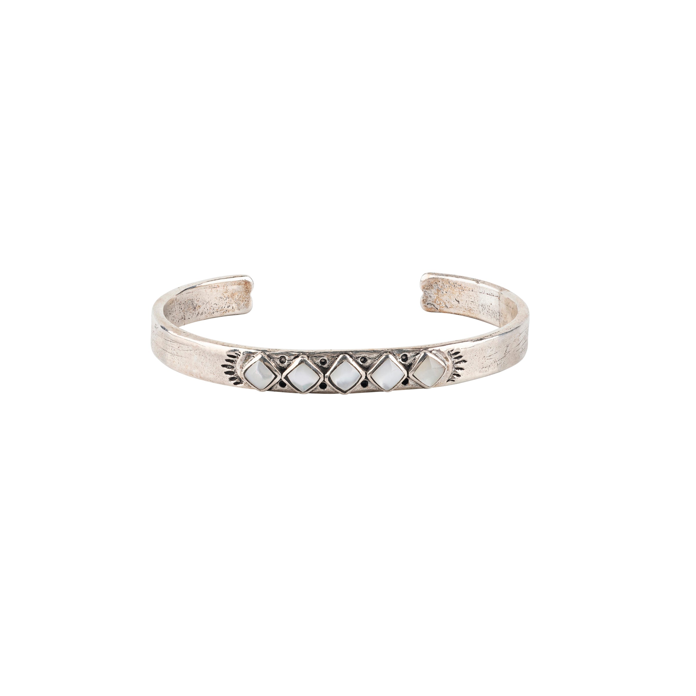 Vintage inspired cuff from our nomad collection that features sterling silver with diamond shaped mother of pearl stones.