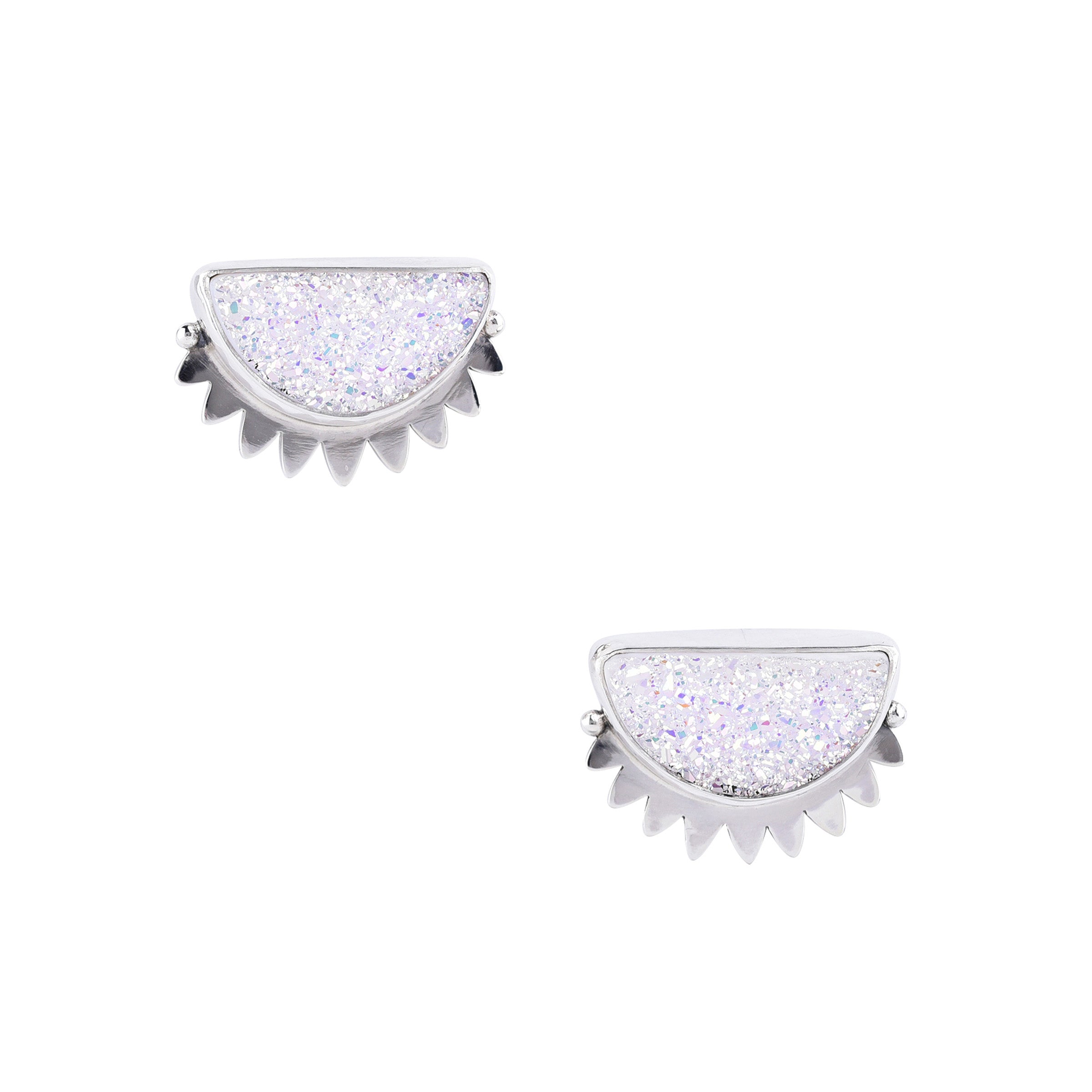 A pair of white druzy earrings with a sparkling design, set in sterling silver.