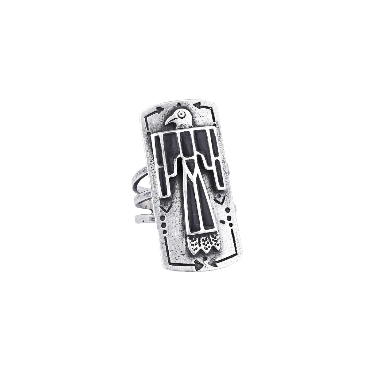 A sterling silver shield ring with onyx stones inlayed into an intricate thunderbird design. Added stamping and the split shank design of the band make this ring exceptional. 