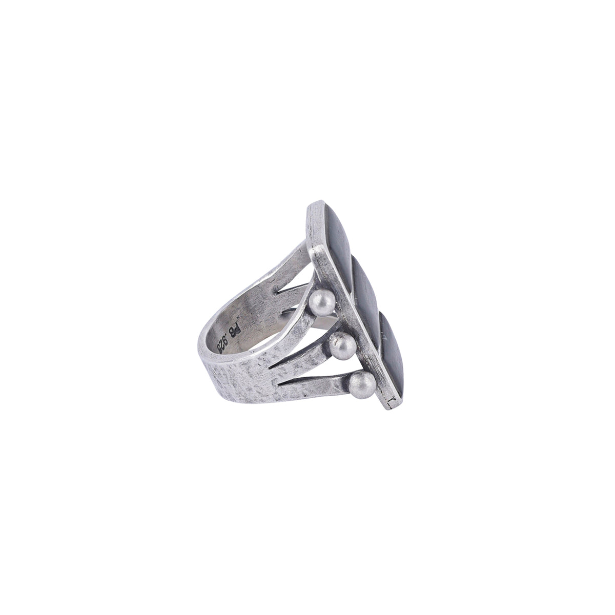 A sterling silver ring featuring three stacked rectangular onyx stones, accented with small silver beads on the sides, with a split shank band.