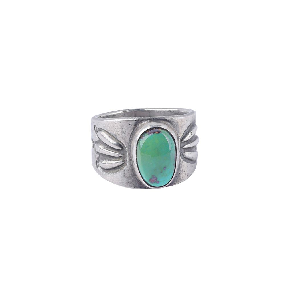 Ingot coin silver ring with stamping and an oval green turquoise stone.