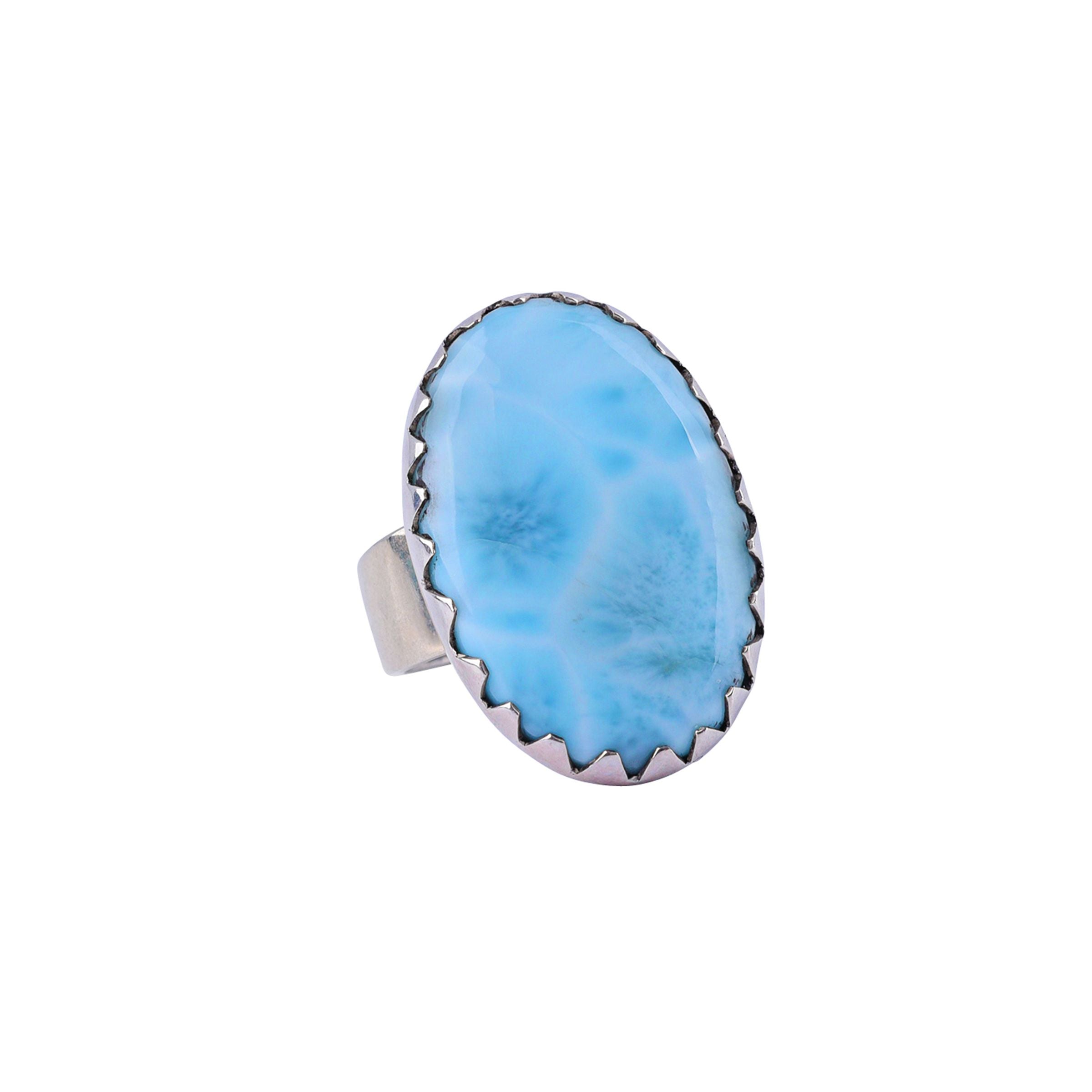 Sterling silver ring with sawtooth bezel with a larimar stone.
