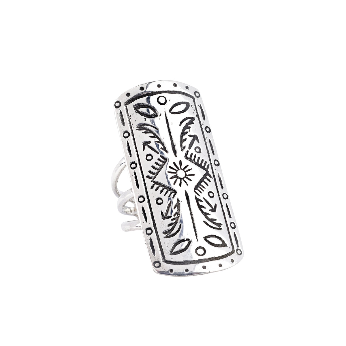 A sterling silver shield ring with intricate stamped arrows and a sun with geometric patterns and a split shank design.