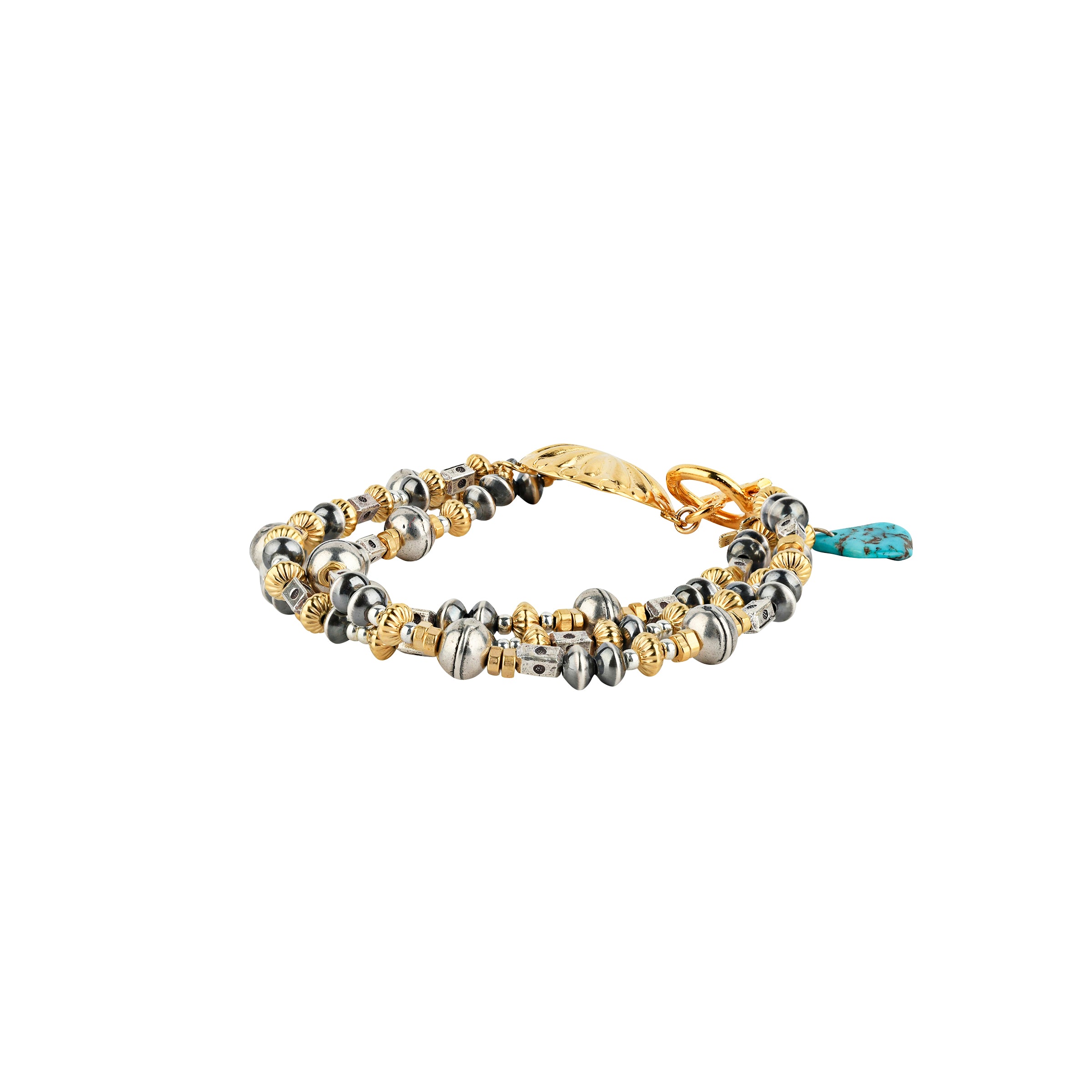 A beaded, three-strand bracelet strung with Desert Pearl Saucers, stamped Sterling Silver Thai beading, and tones of 14k Gold Plate accent beading that all come together to a 14k Gold Plated Concho.