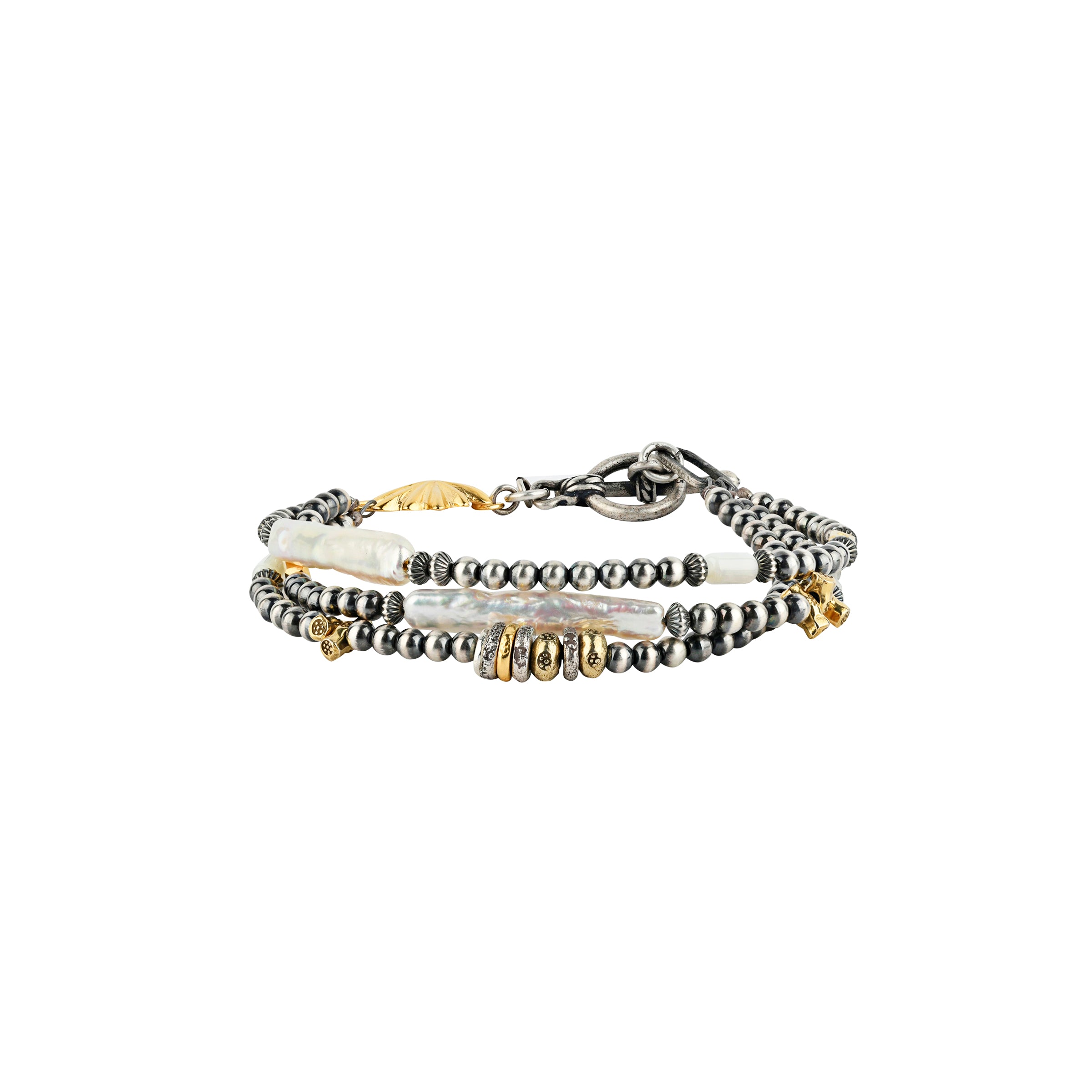 Our Dusk and Dawn Bracelet is a three-strand piece strung with Desert Pearls, Freshwater Pearl, and 14k Gold Plate beading.