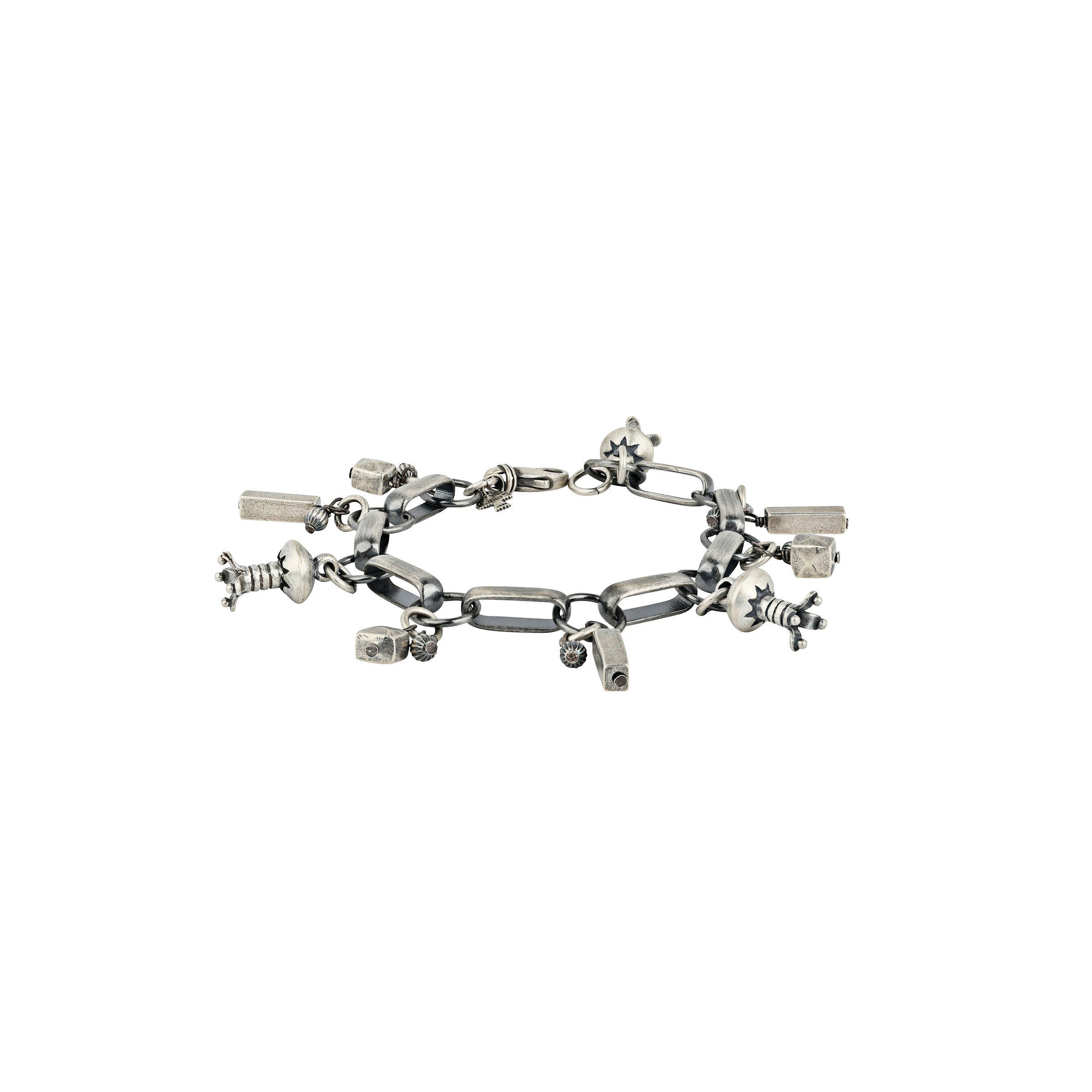 Sterling Silver charm bracelet featuring fluted blossoms and vintage inspired beading