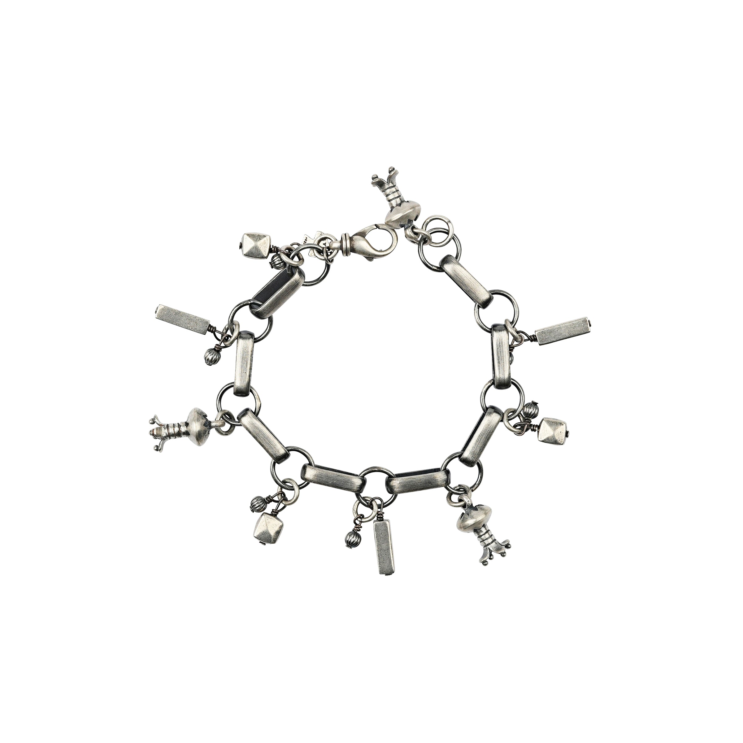 Sterling Silver charm bracelet featuring fluted blossoms and vintage inspired beading