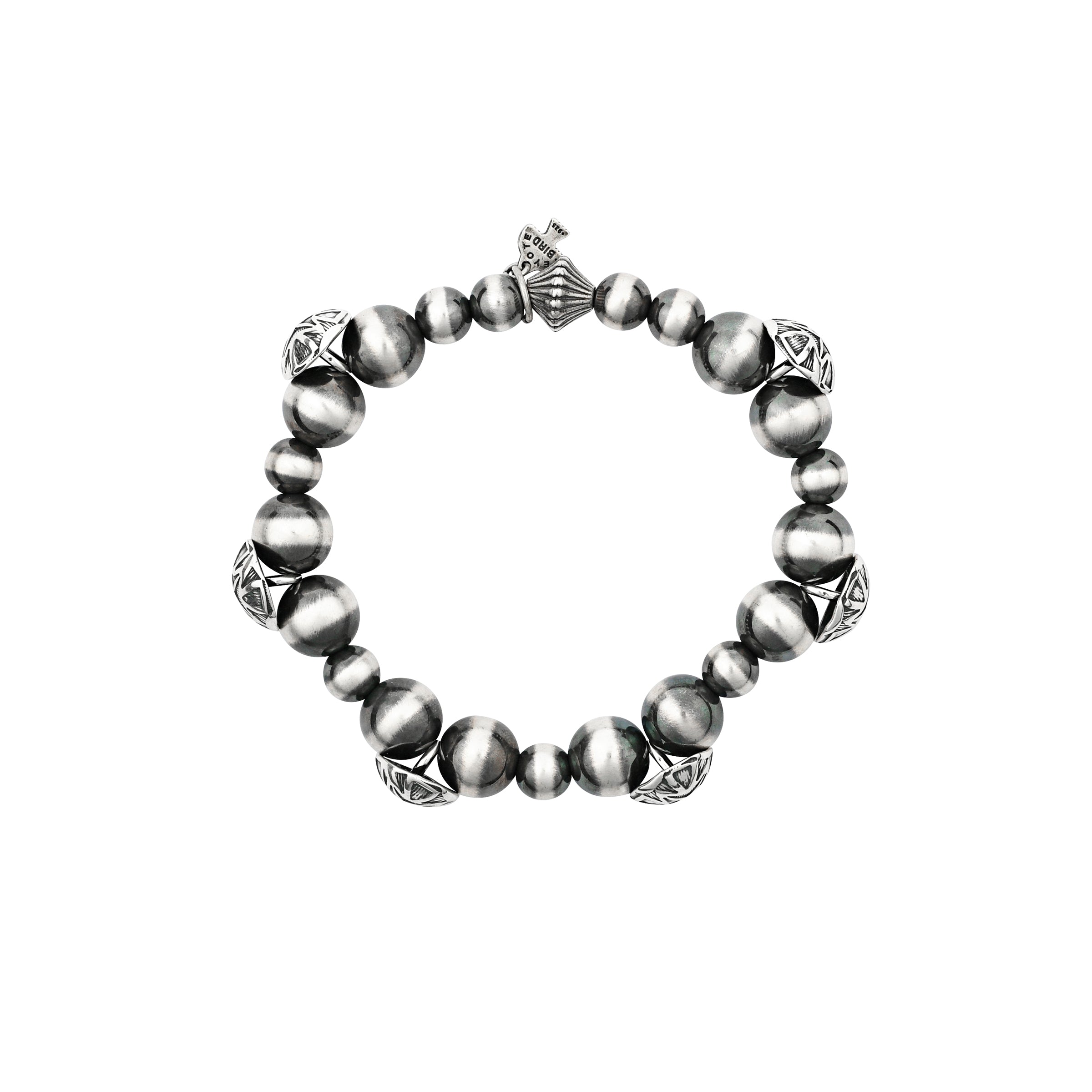 Sterling Silver beaded men's bracelet strung with Desert Pearls, Concho's and vintage inspired beading
