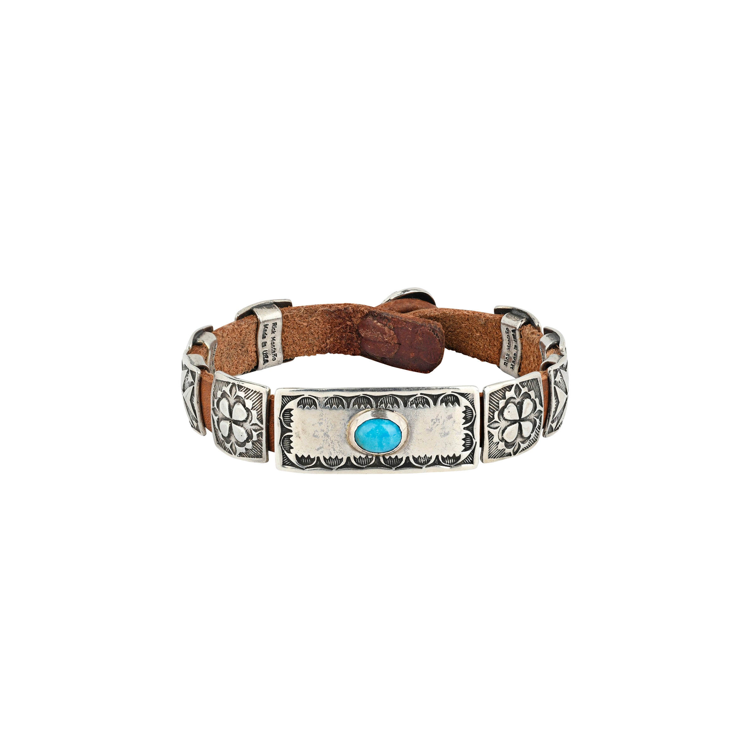 A handmade Southwestern style concho bracelet made with stamped Sterling Silver conchos on brown leather featuring Blue Turquoise