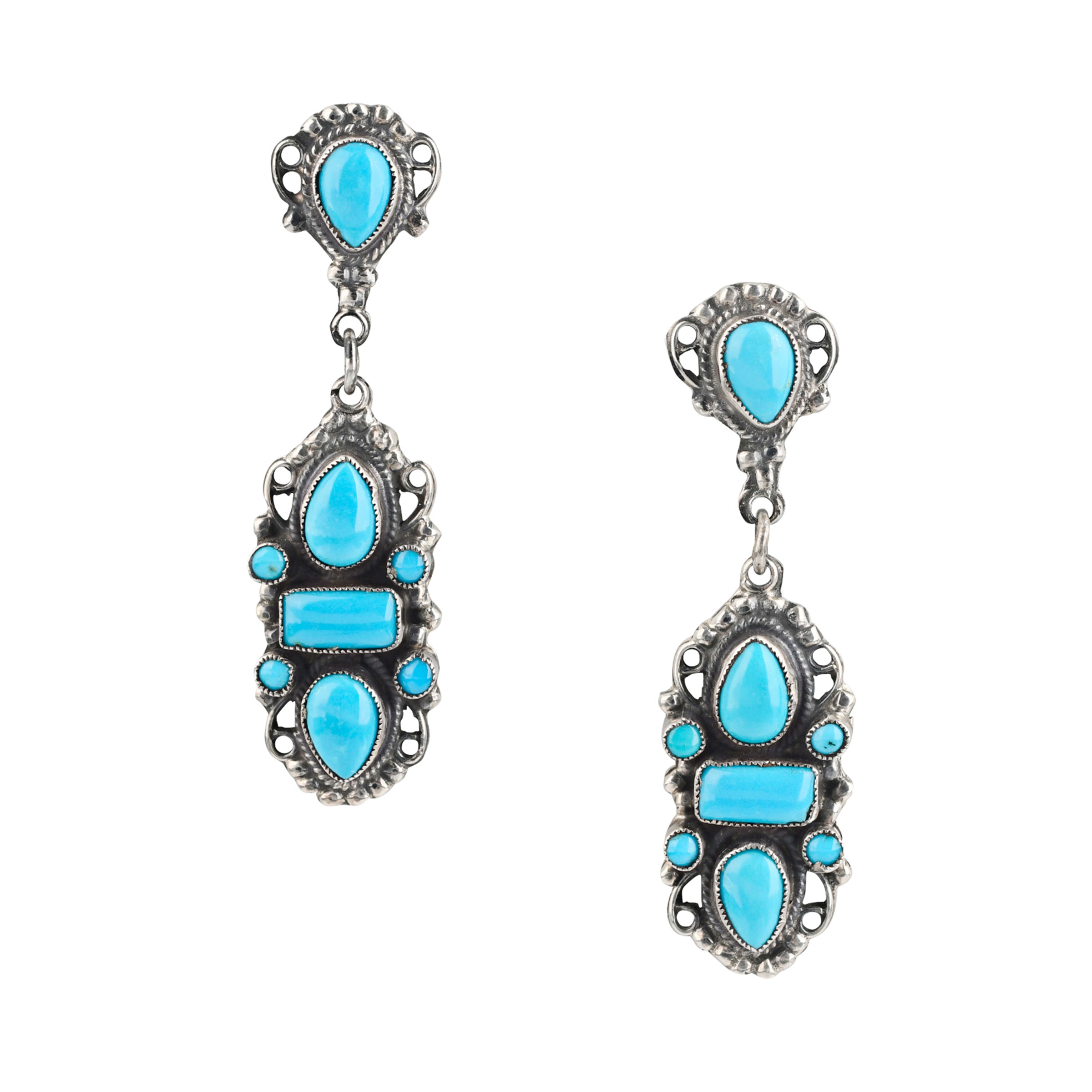 Beautifully handcrafted Sterling Silver Earrings adorned with Blue Turquoise and filigree embellishments