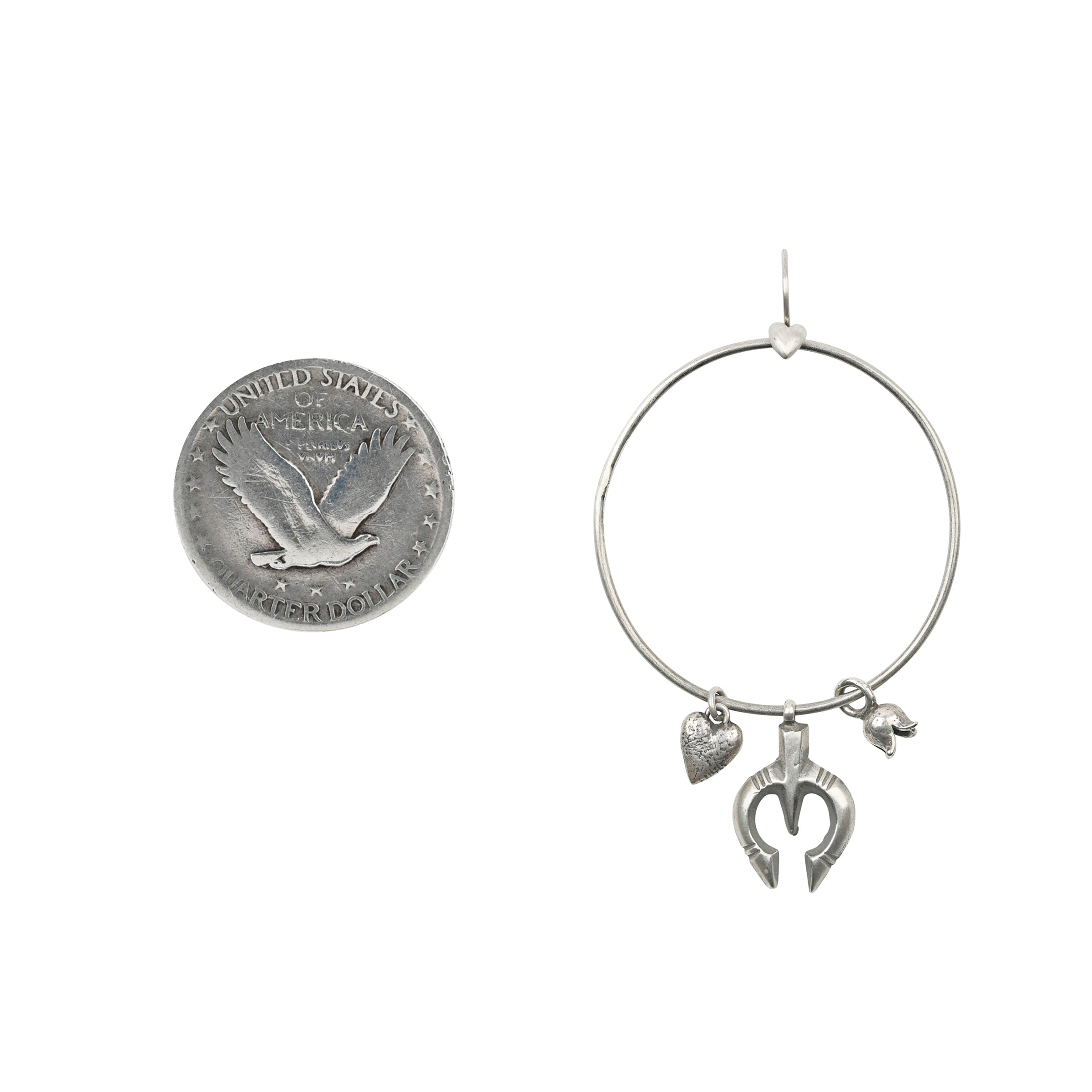 Sterling Silver Hoop Earrings featuring charms of hearts, mini blossoms, and vintage-inspired Naja pendants.