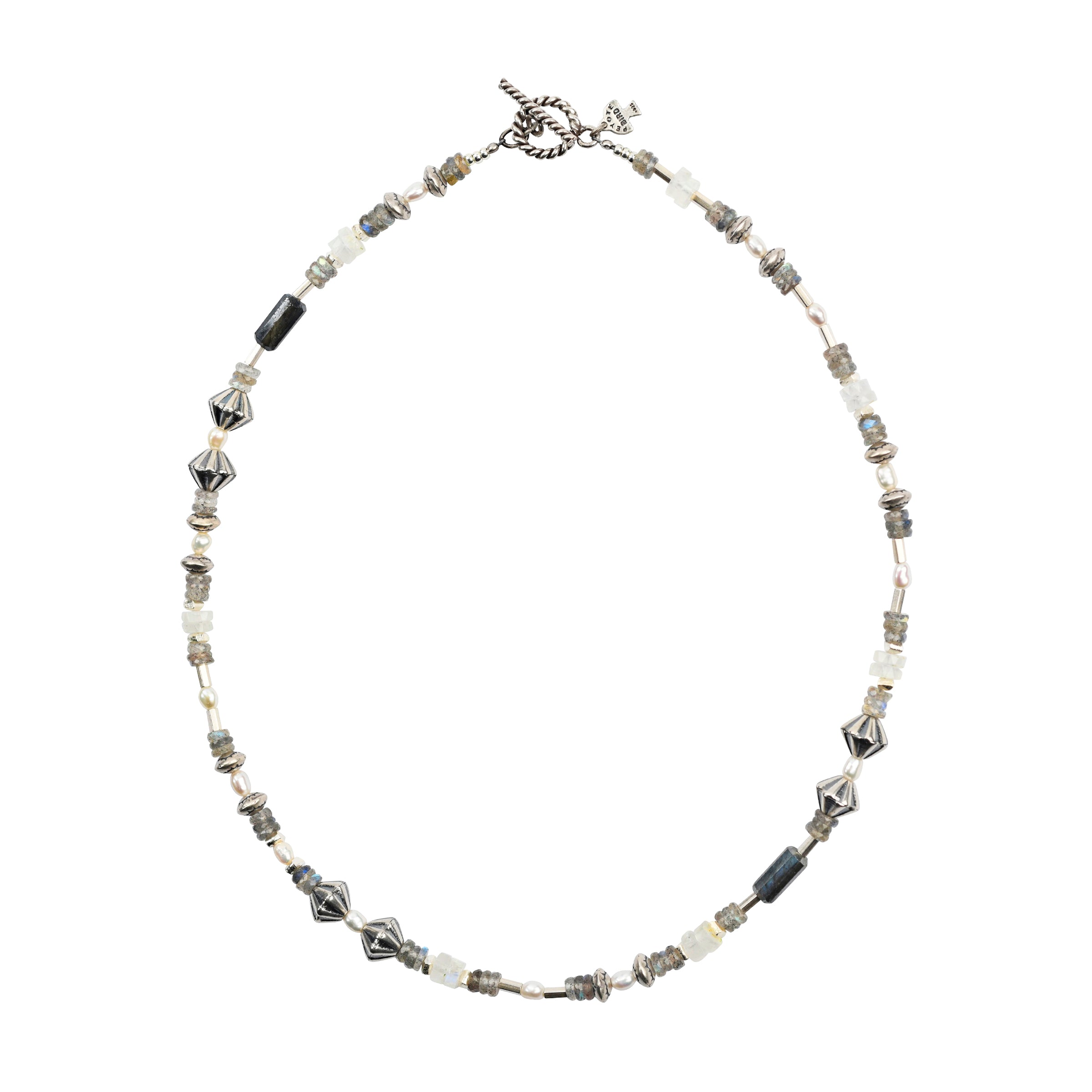 A Peyote Bird Original beaded necklace strung with Labradorite, Moonstone, Sterling Silver Stamped beading, and Freshwater Pearl accents. Finished with a Sterling Silver roped toggle for a stylish fit.