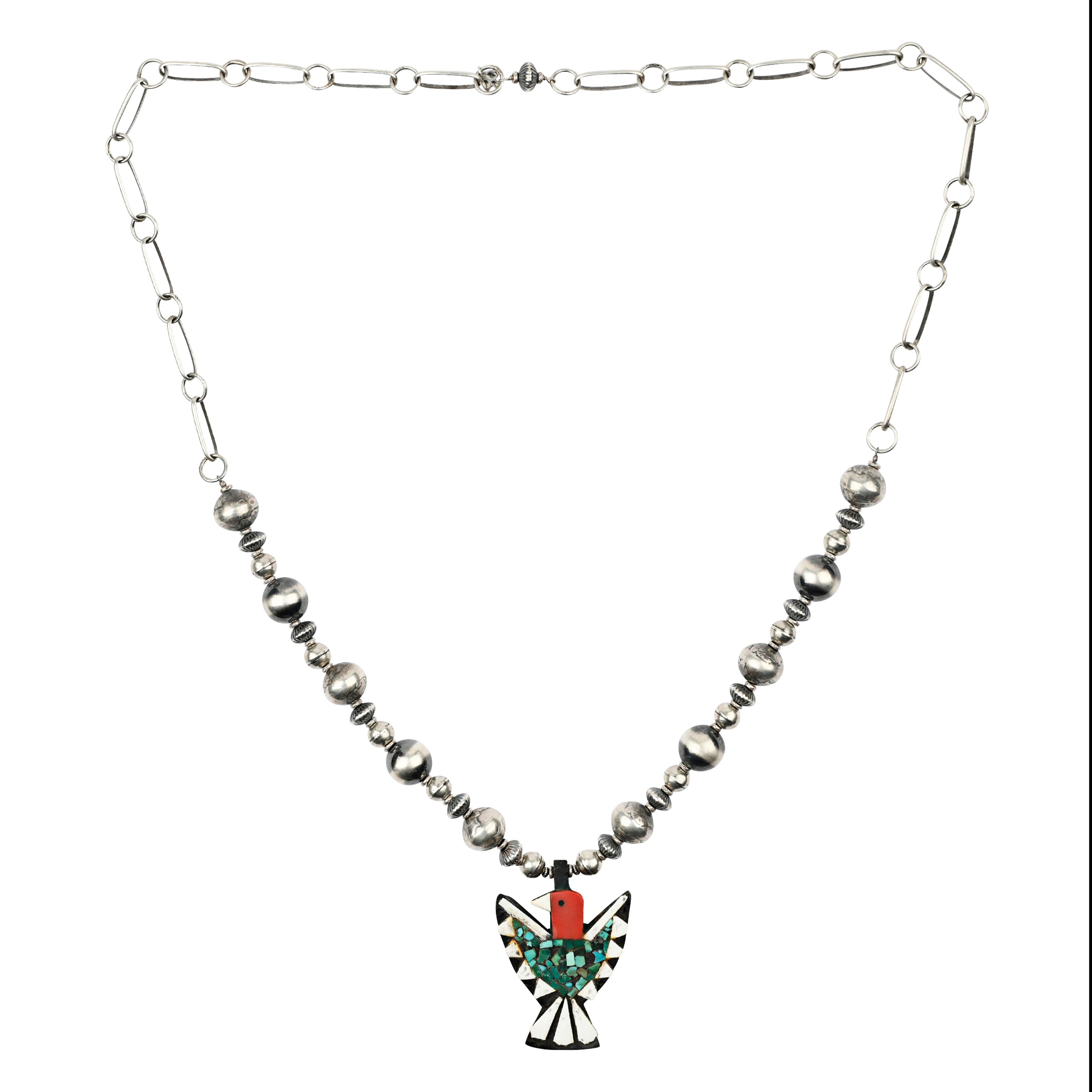 A necklace featuring a vintage Battery Bird Pendant accompanied by vintage inspired beading on chain