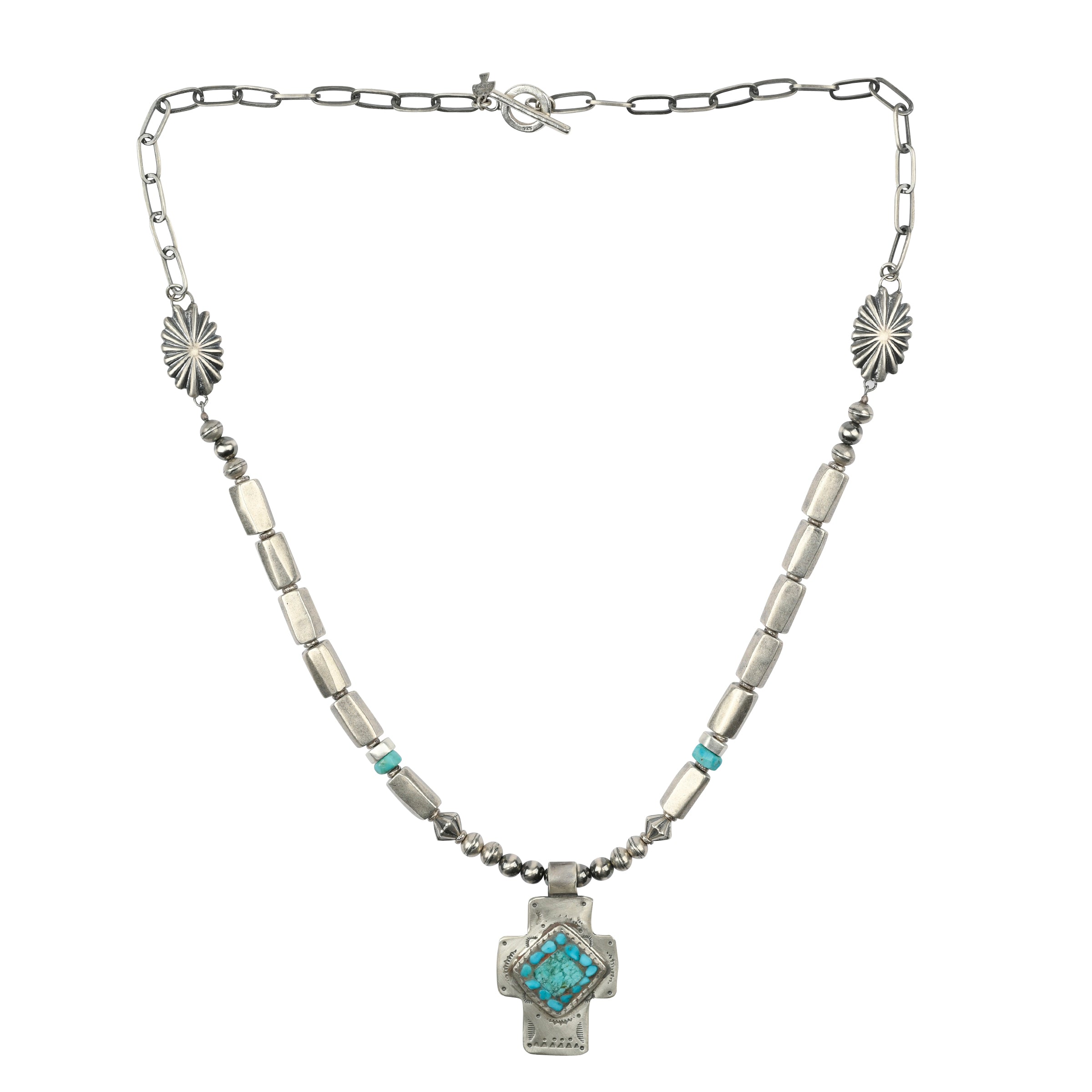 A Necklace featuring a Sterling Silver and Blue Turquoise mosaic Cross by Charlie Favour accompanied with vintage inspired beading and classic Southwestern conchos