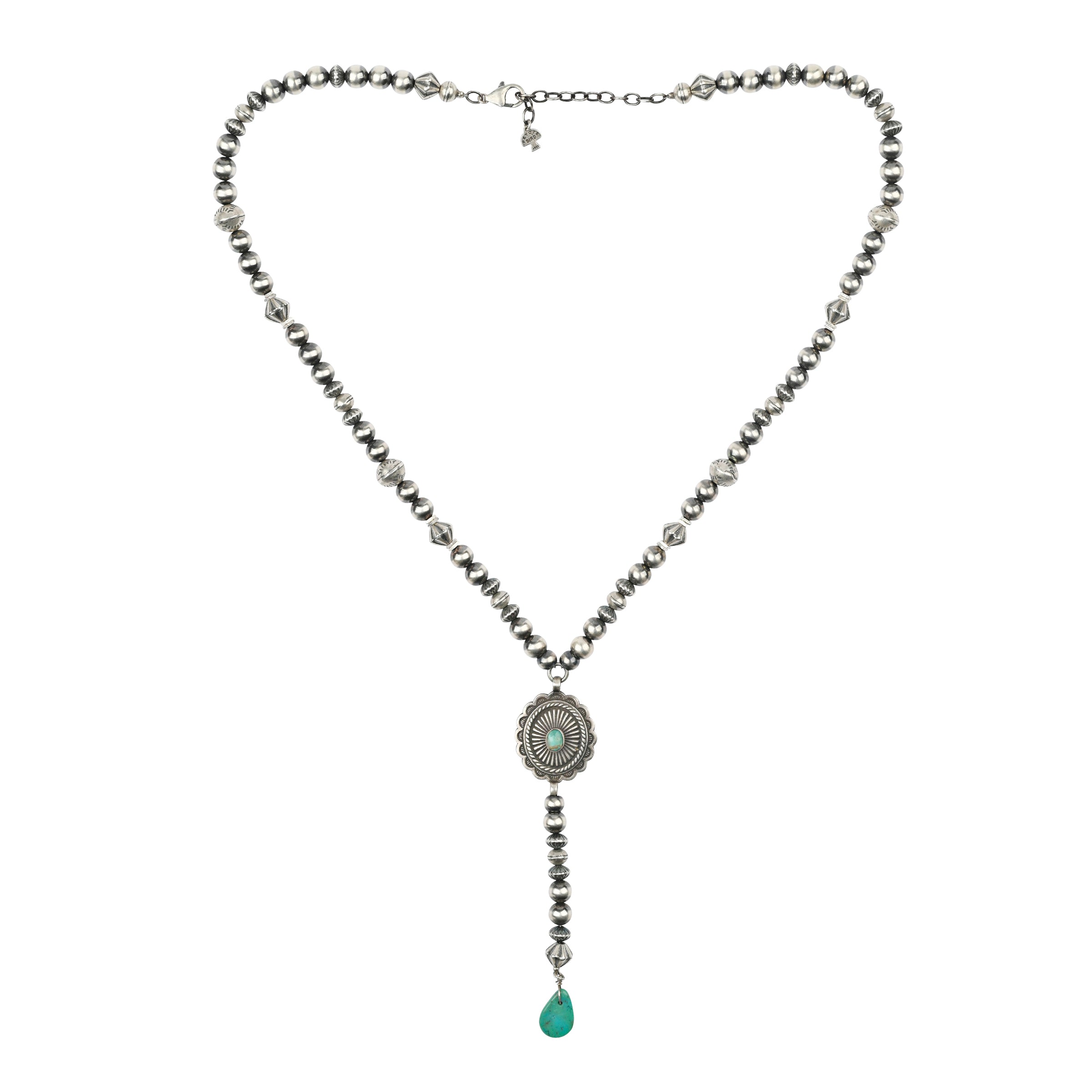 A beautiful and classic Western statement necklace featuring a Southwestern concho with Blue Turquoise strung with Desert Pearls and vintage inspired beading finished with a tab of Blue Turquoise.