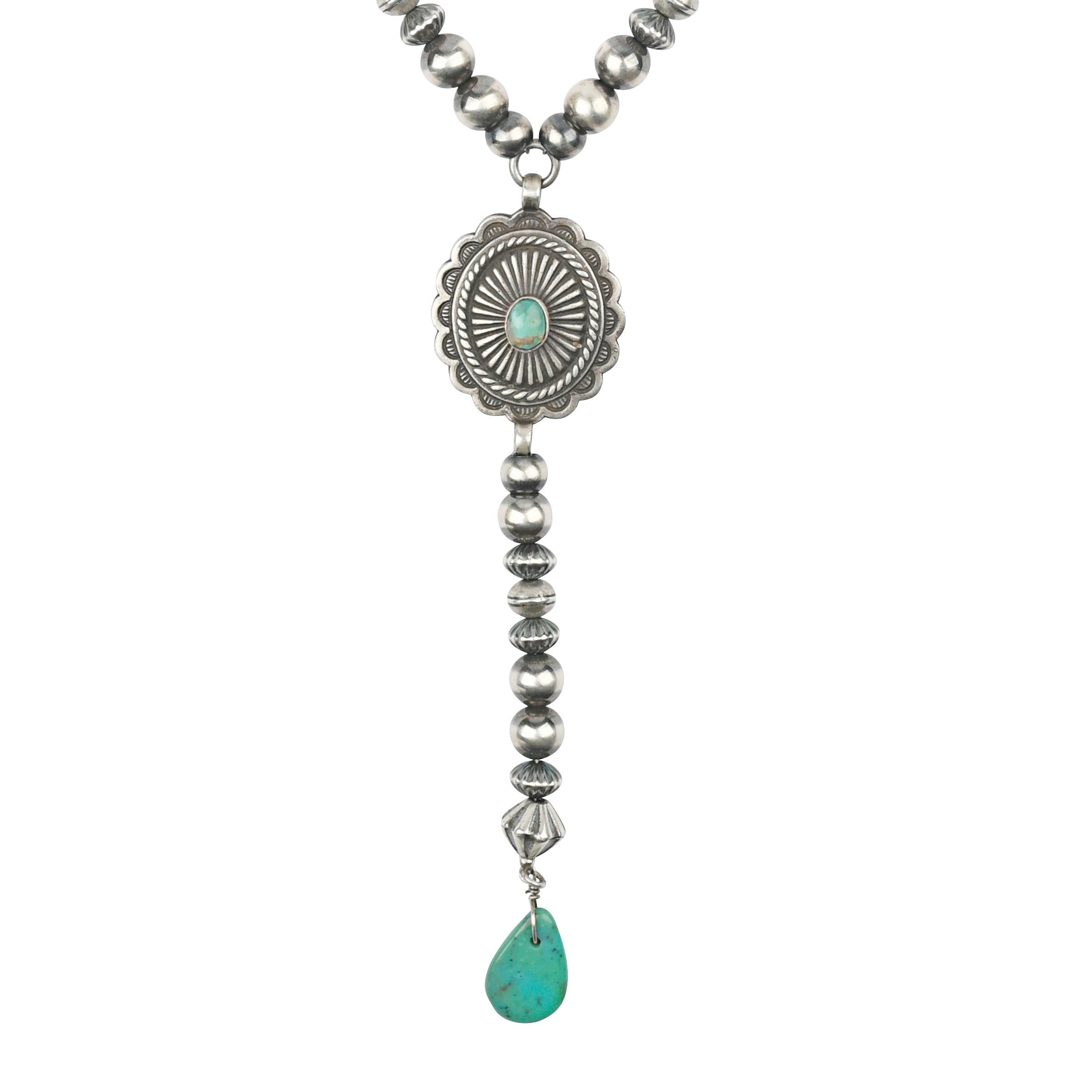 A beautiful and classic Western statement necklace featuring a Southwestern concho with Blue Turquoise strung with Desert Pearls and vintage inspired beading finished with a tab of Blue Turquoise.