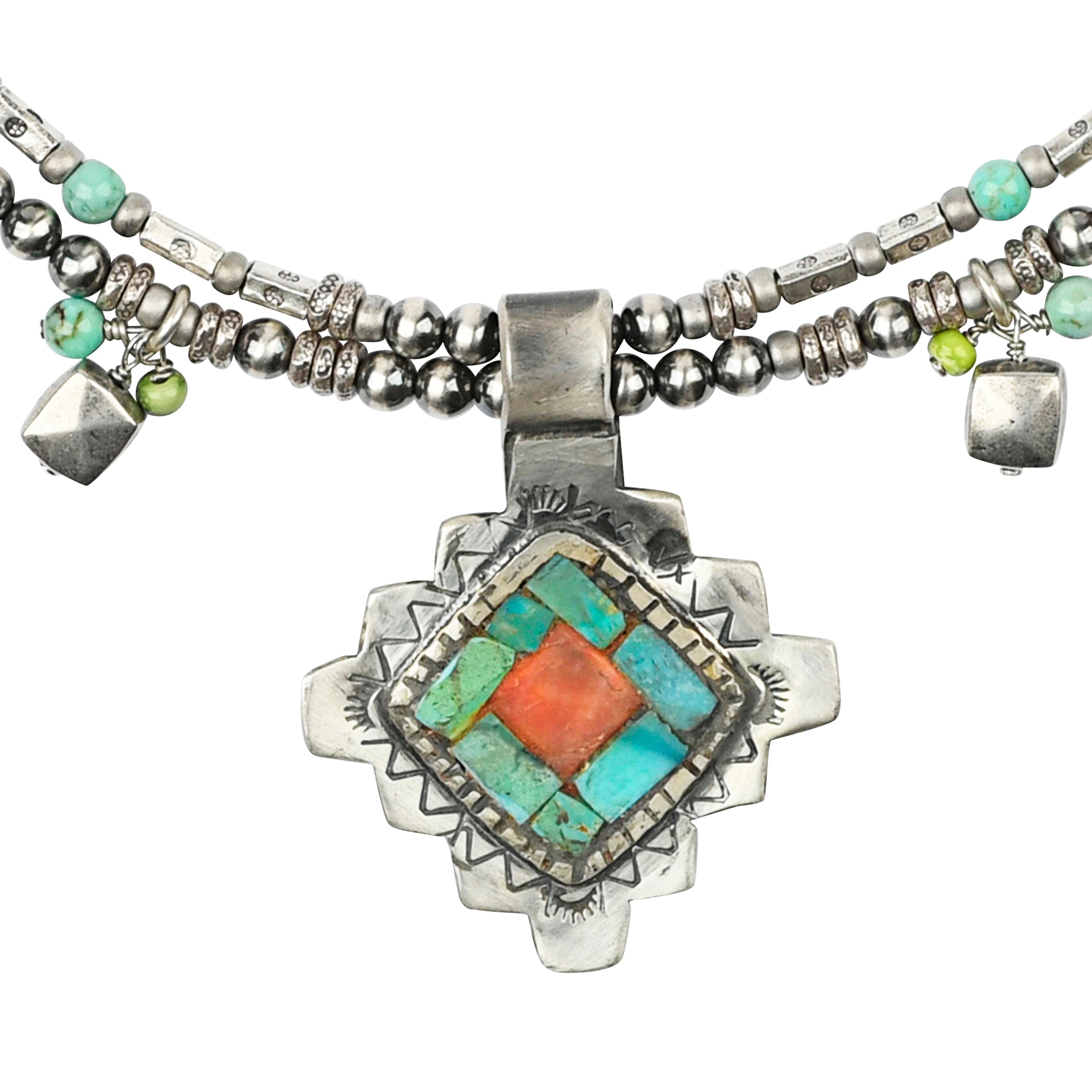 A beaded, multi-strand necklace strung with Desert Pearls, Blue Turquoise, and Green Turquoise featuring a handmade mosaic Southwestern diamond shaped pendant by Charlie Favour