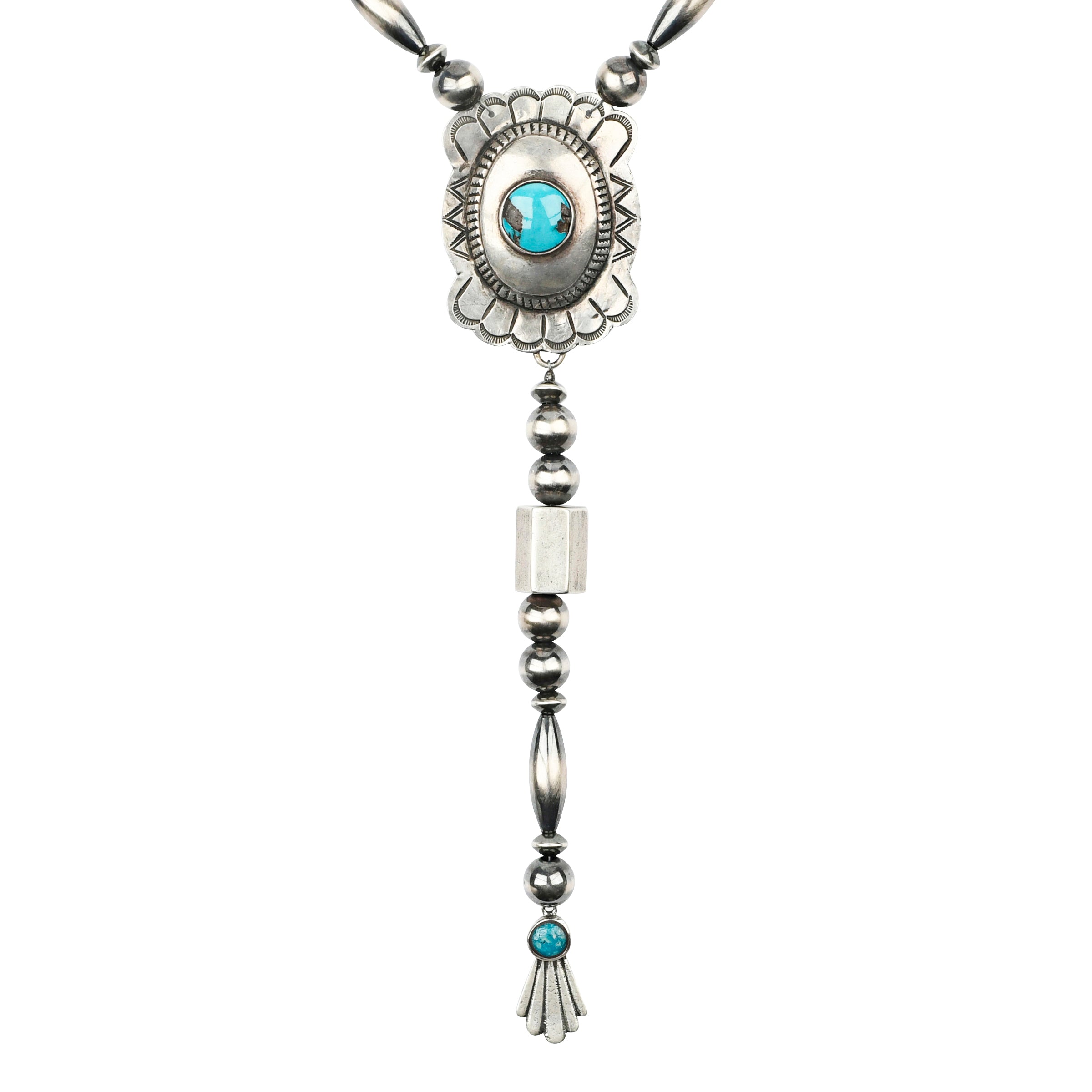 A Sterling Silver Y-Neck Necklace featuring a Southwestern concho with Blue Turquoise as the centerpiece strung with Desert Pearls and vintage inspired beading.