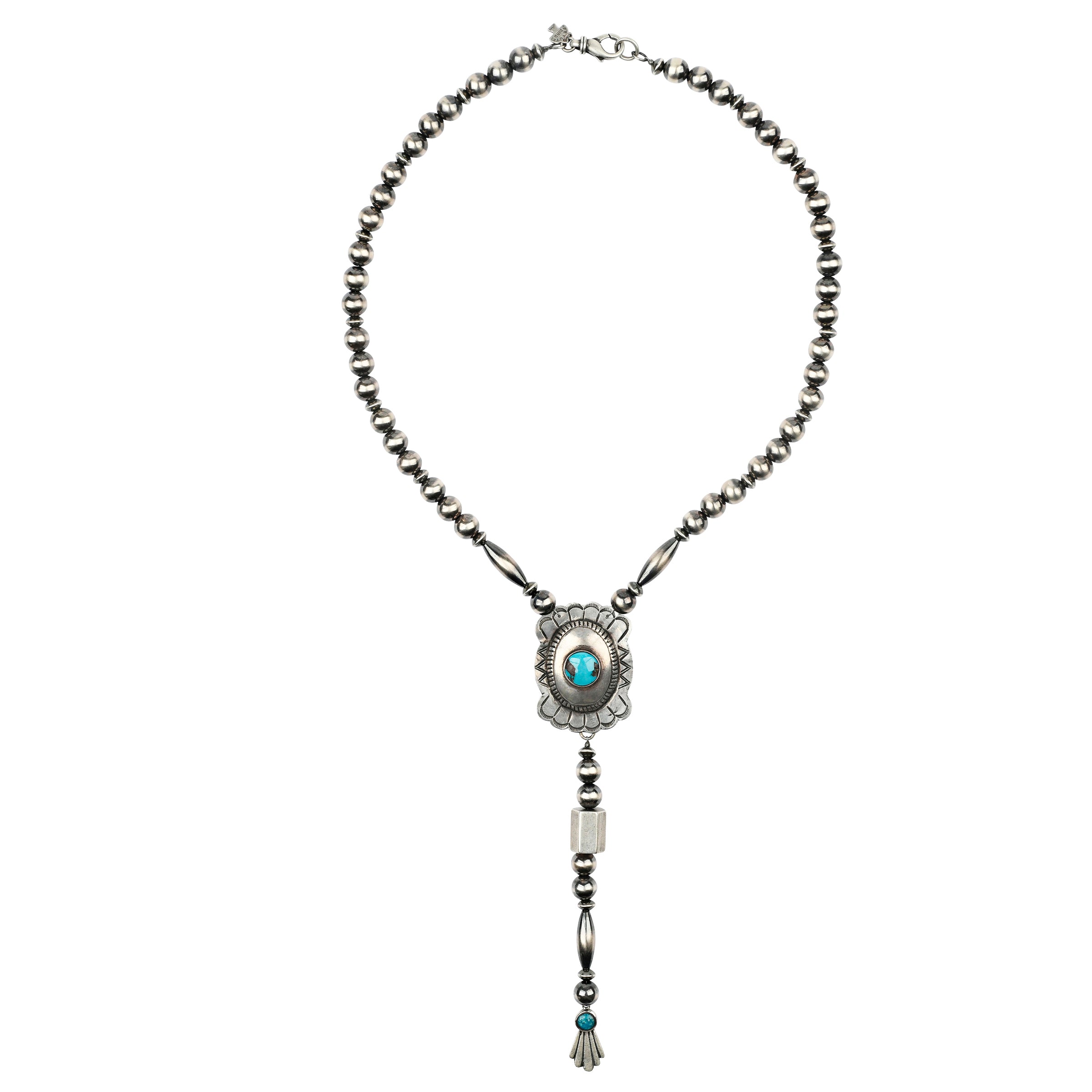 A Sterling Silver Y-Neck Necklace featuring a Southwestern concho with Blue Turquoise as the centerpiece strung with Desert Pearls and vintage inspired beading.