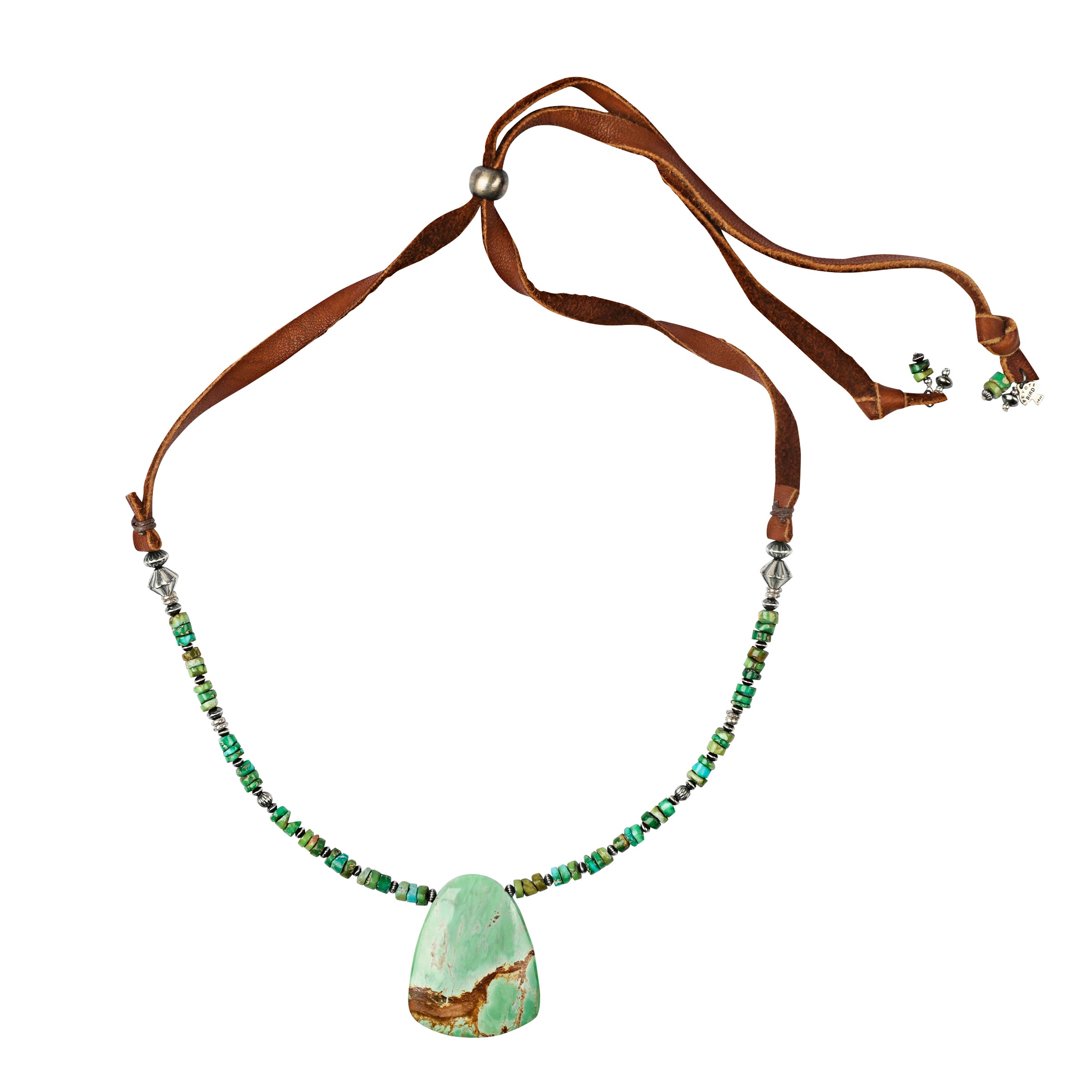 A stunning slab of Green Turquoise strung on deerskin leather with Sonoran Gold Green and Blue Turquoise and corrugated Sterling Silver beading.
