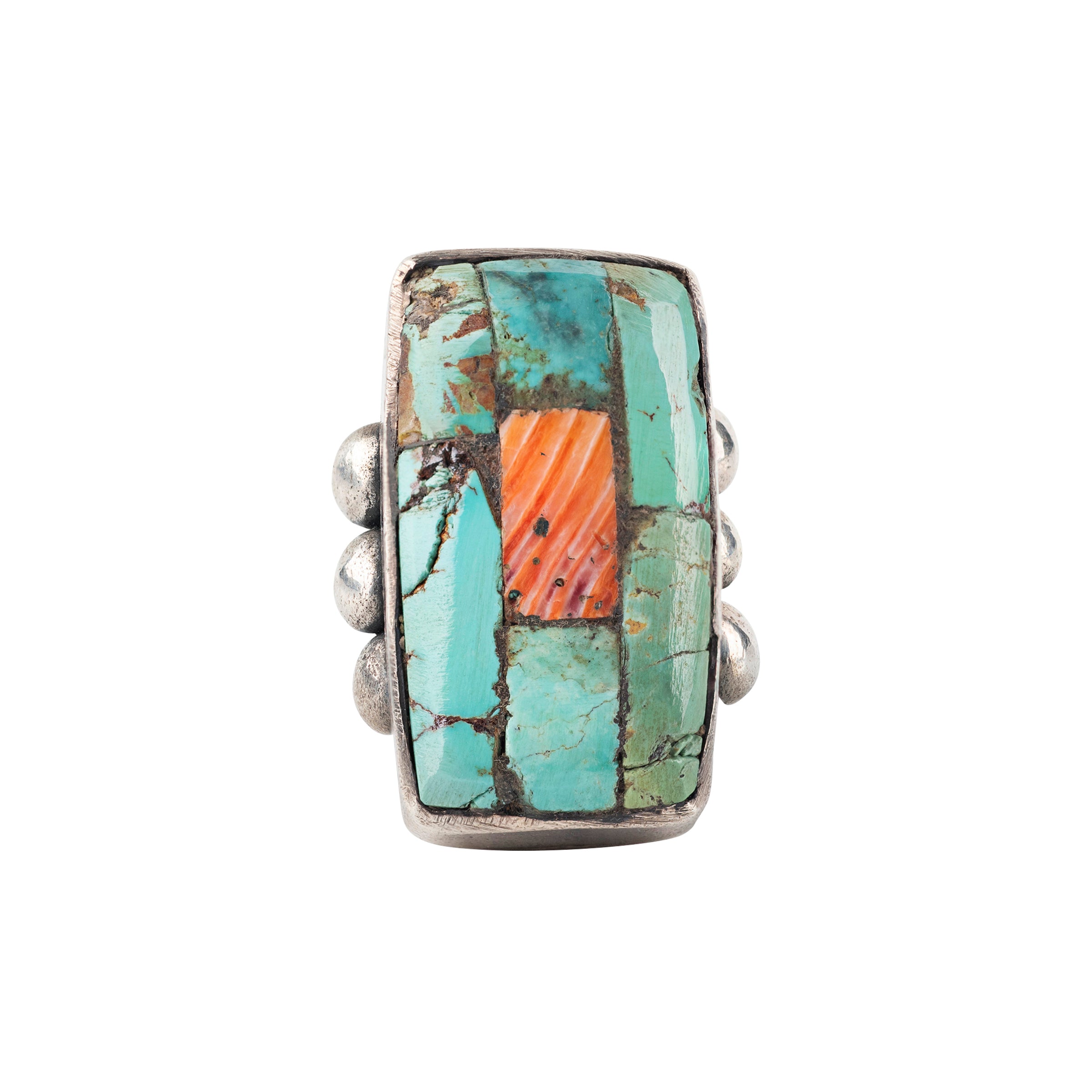 Ingot coin silver ring with blue and green turquoise stones and one orange spiny oyster shell in the center.
