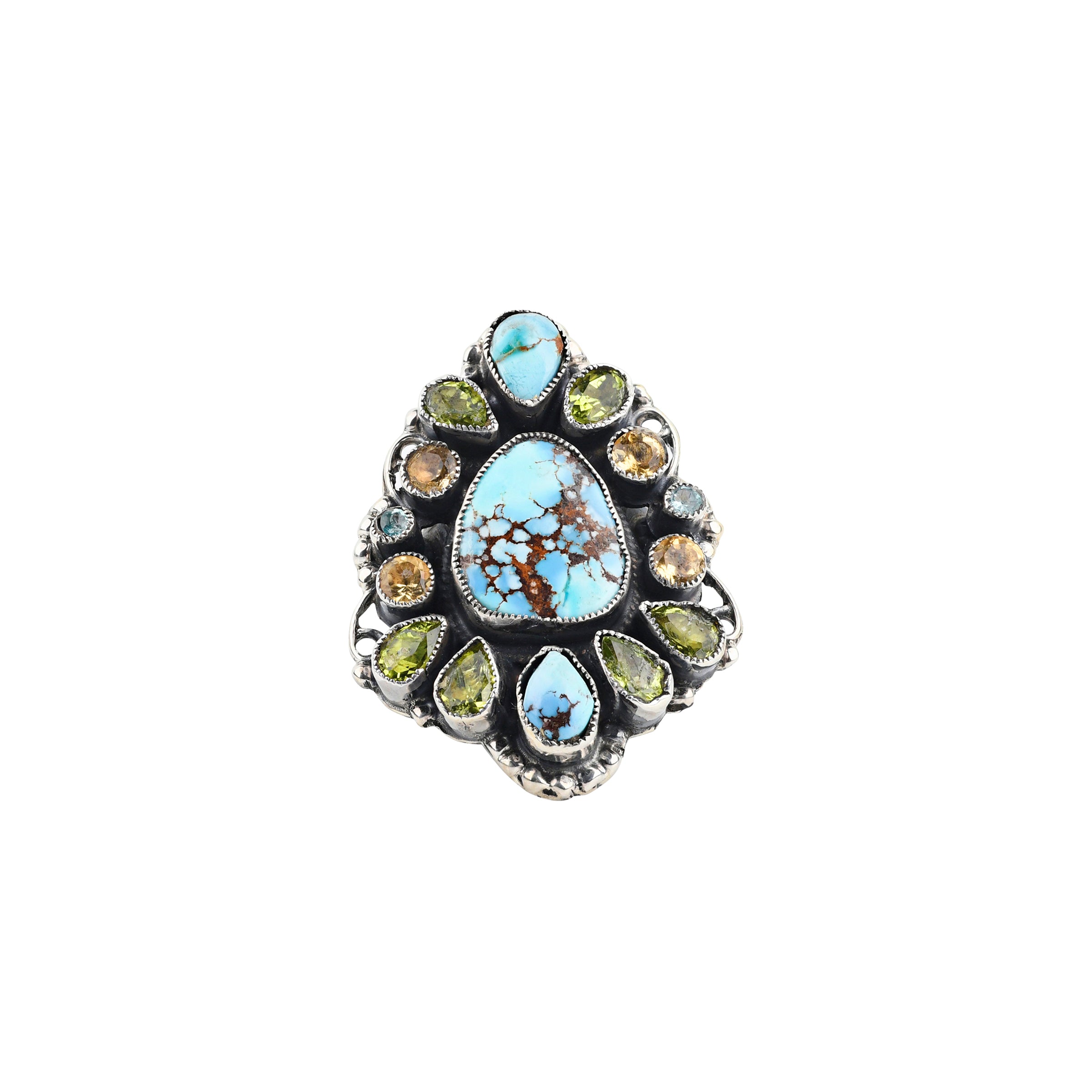 A handcrafted Sterling Silver shield ring featuring a stunning piece of Blue Turquoise surrounded by Blue Turquoise and Peridot teardrops and round Citrine. The band features floral detailing finished with Western style stamping.