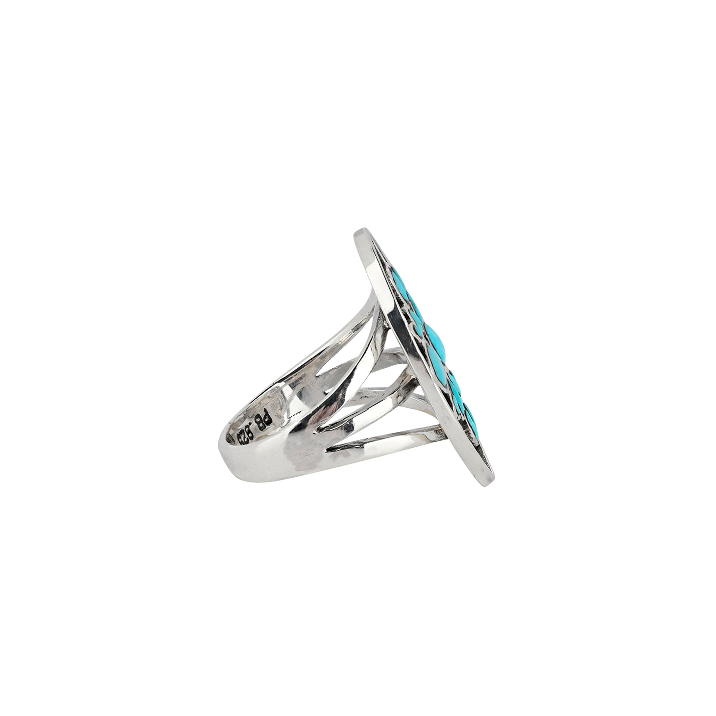 Sterling Silver Ring adorned with teardrops of Turquoise 