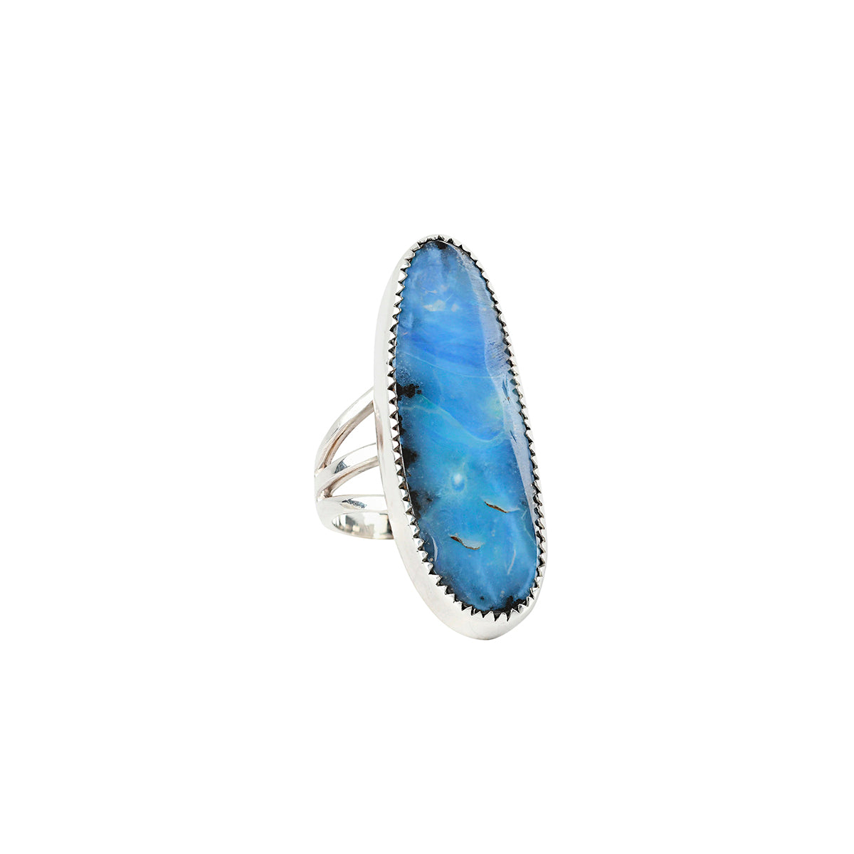 Sterling Silver and Opal Ring set with Sawtooth Bezel. 