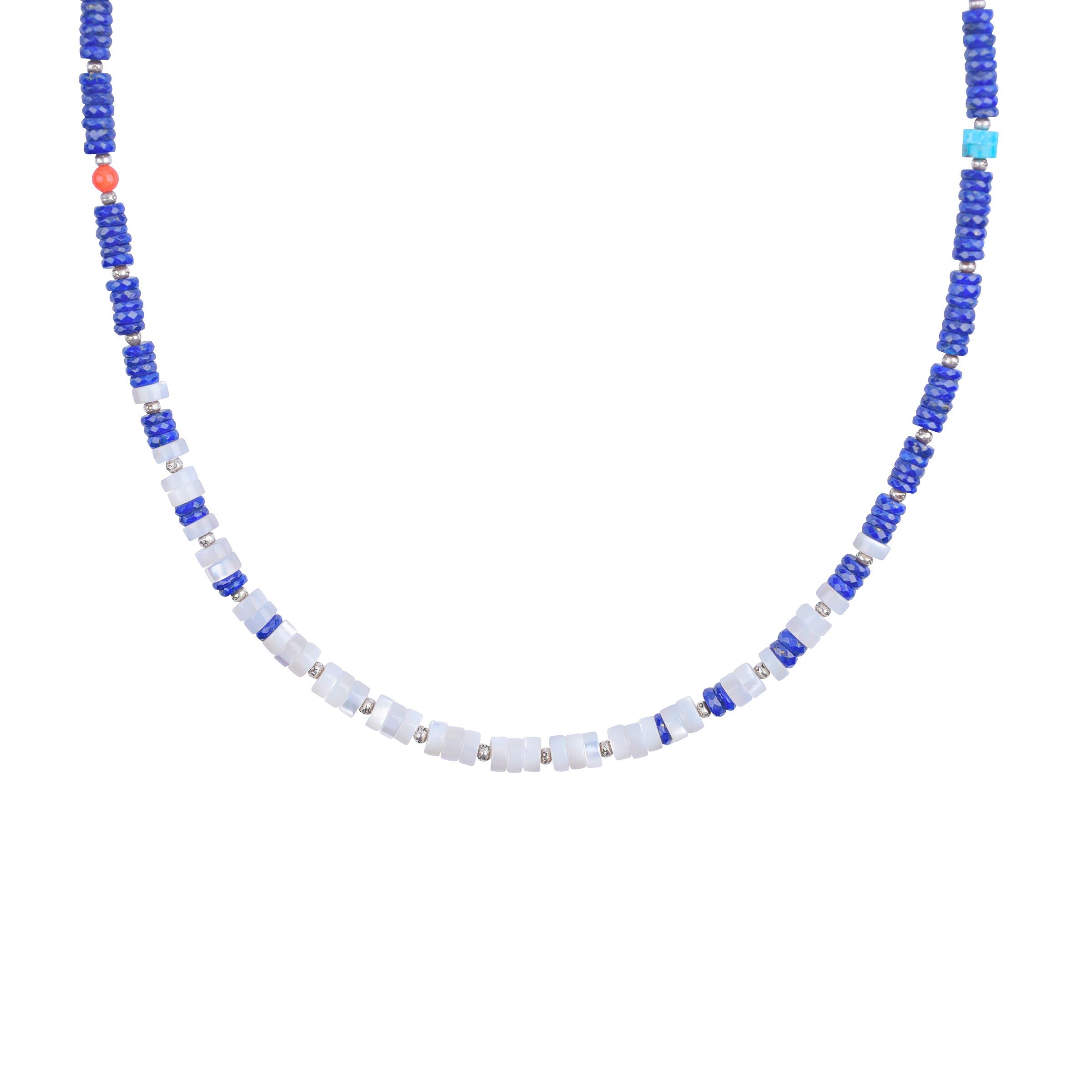 The Après Ski Necklace is a Peyote Bird Original. Featuring sterling silver, lapis, blue turquoise, mother of pearl, ruby, red coral, and labradorite. Made in USA.
