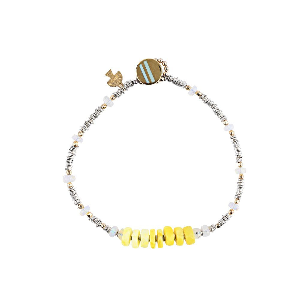 Valerio Bracelet: a stunning blend of dyed yellow opal and Ethiopian opal, accented with gold plated beads and finished with a turquoise inlayed button closure. A Peyote Bird original. Made in the USA.
