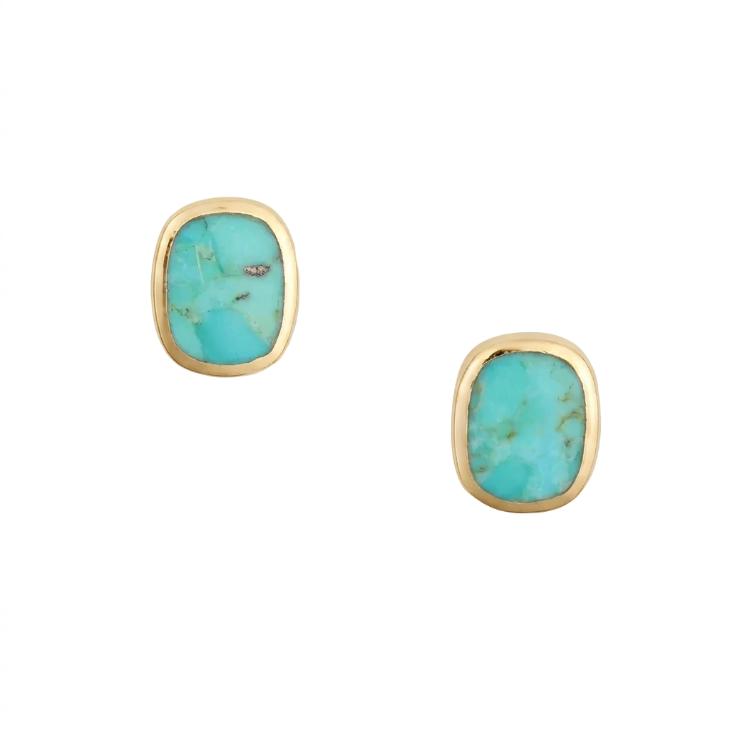 A pair of sterling silver and gold plated stud earrings with rounded rectangular green turquoise cabochons and comfort earring backs.