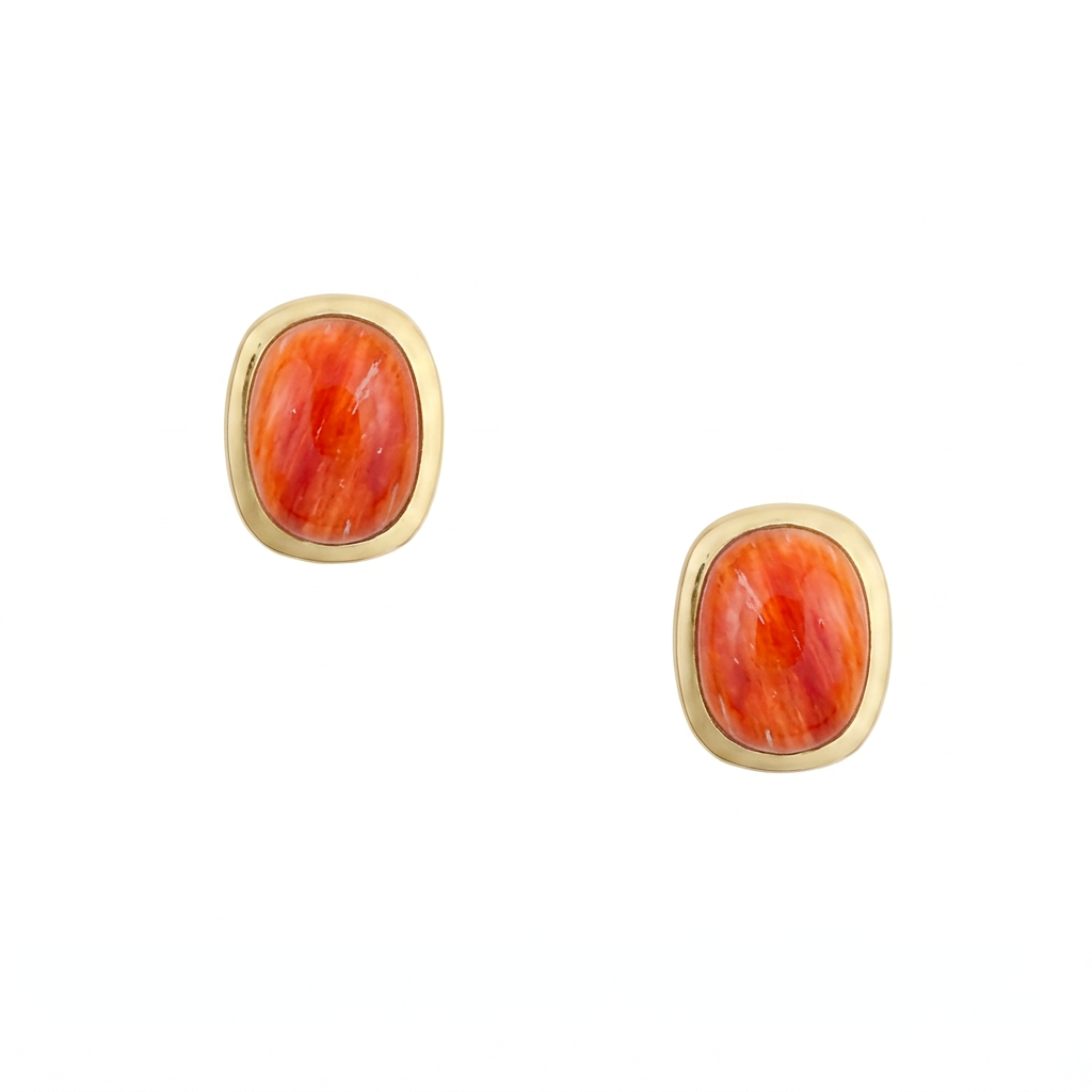 A pair of sterling silver and gold plated stud earrings with rounded rectangular orange spiny oyster shell cabochons and comfort earring backs.