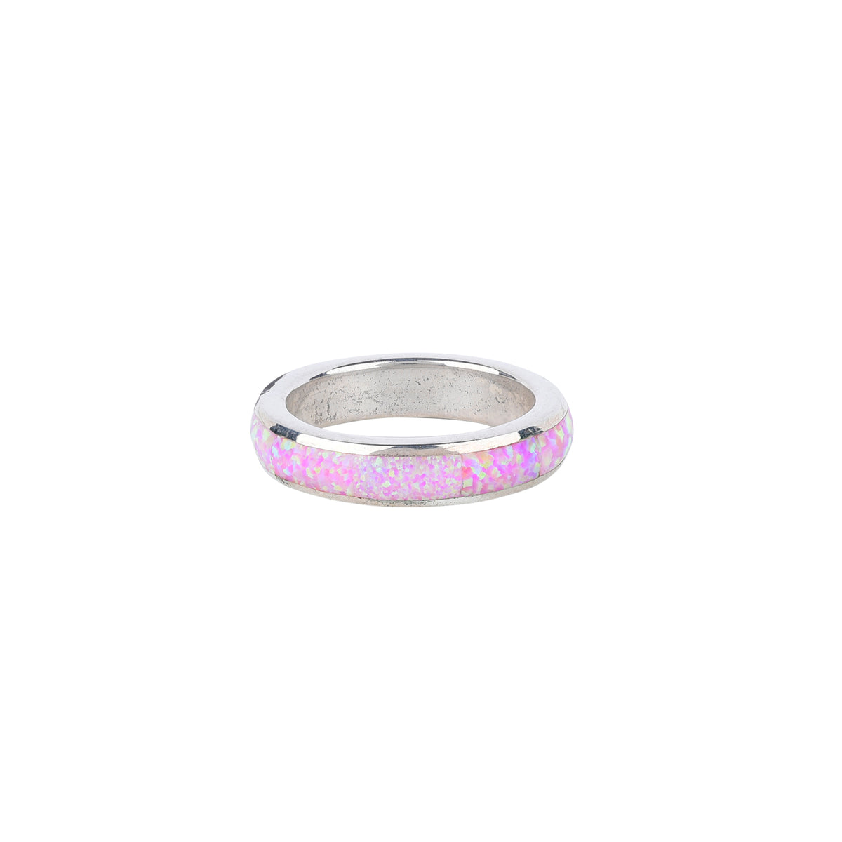 A sterling silver ring with a pink opal inlay.