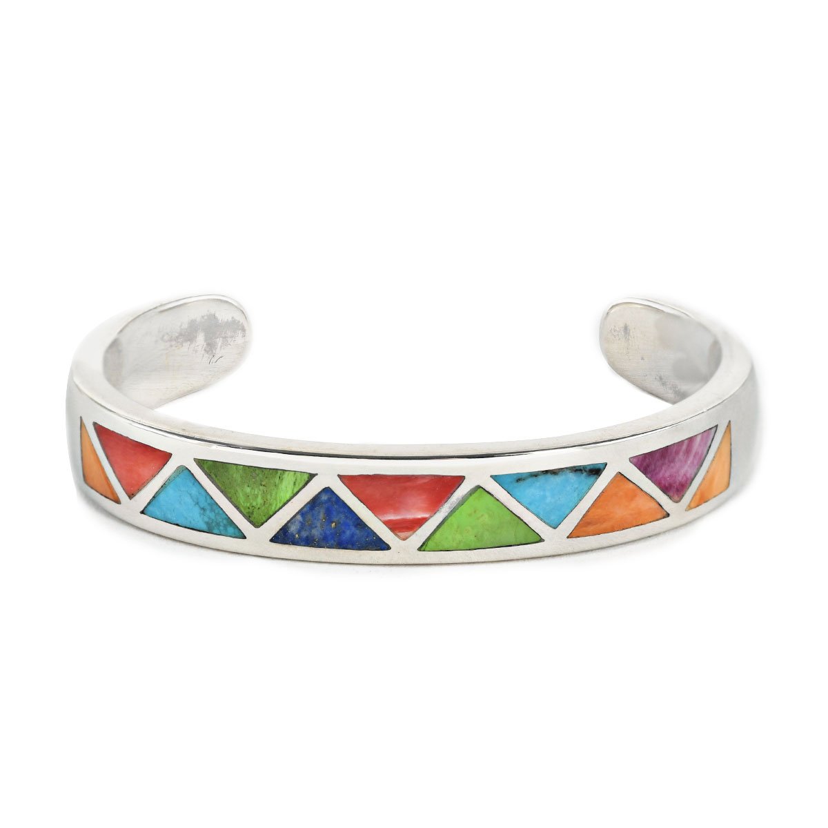 The vintage inspired Arrowhead cuff from our Bird and Arrow line that features sterling silver with blue turquoise, red and orange spiny oyster shell, lapis and gaspeite stone inlay.  