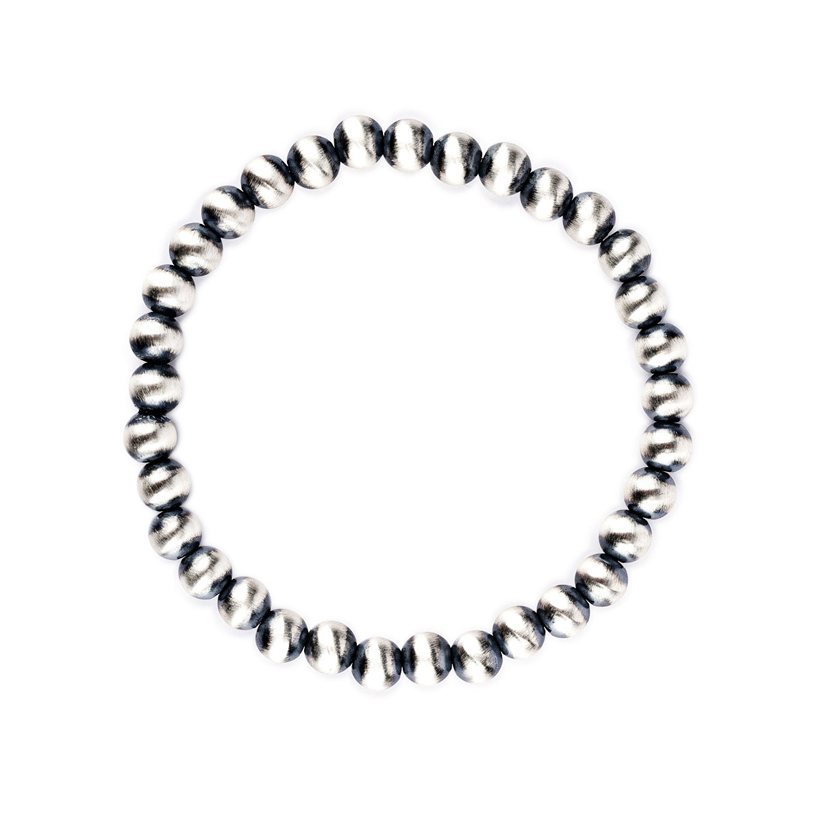 A stretch bracelet featuring round sterling silver beads representing the 'Desert Pearl' style.