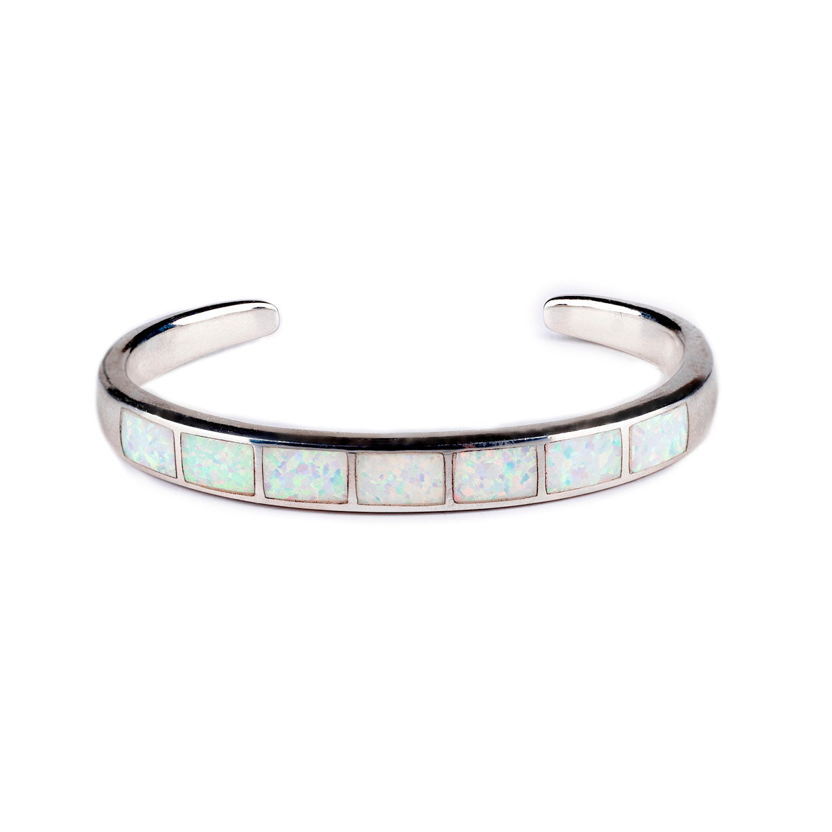 The vintage inspired Galisteo cuff from our Bird and Arrow line that features sterling silver with white opal stone inlay.  