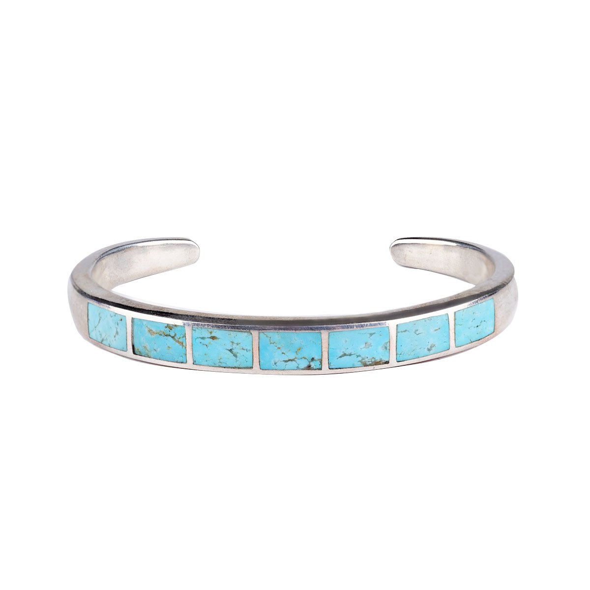 The vintage inspired Galisteo cuff from our Bird and Arrow line that features sterling silver with blue turquoise stone inlay.  