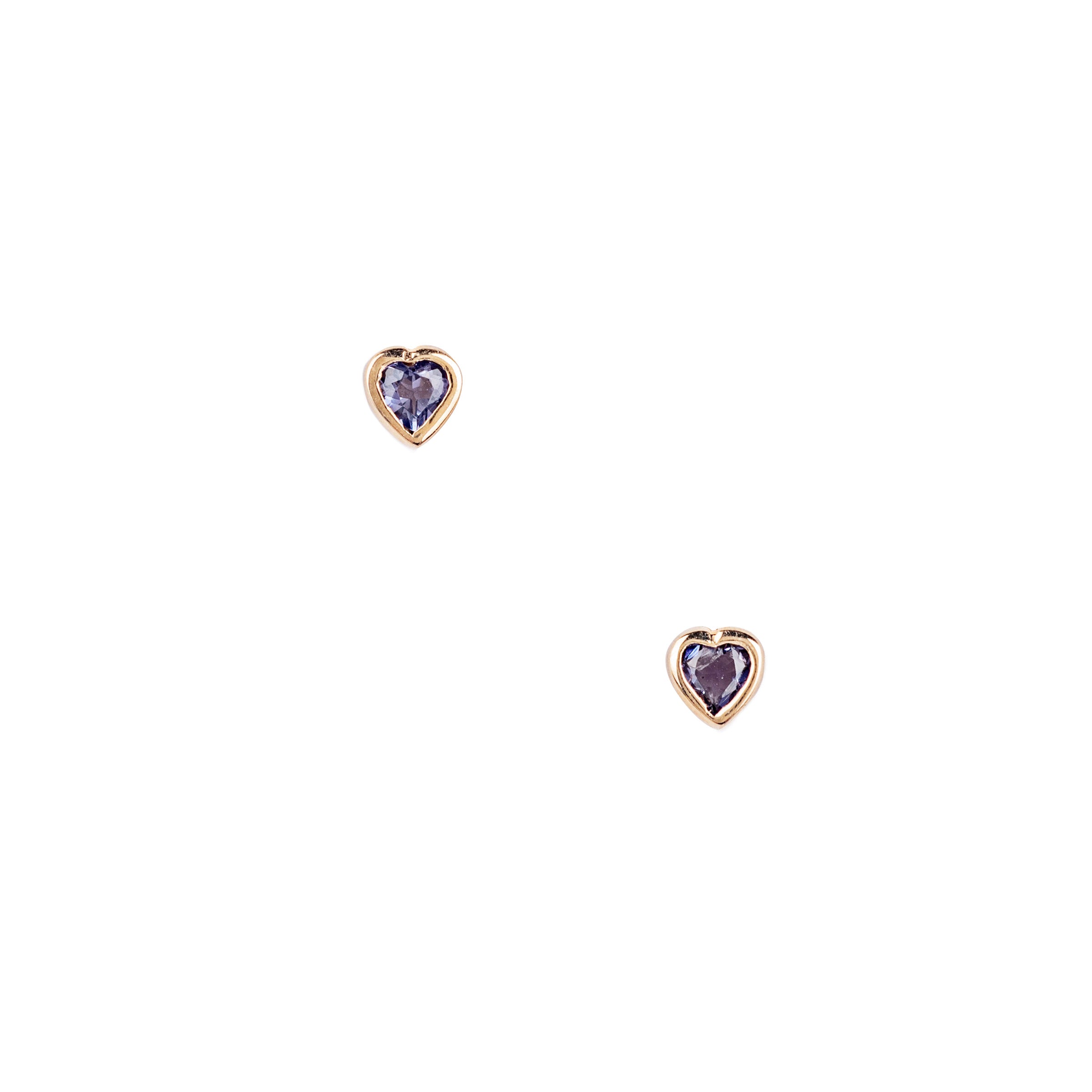 These gorgeous 14K Gold mini heart earrings sparkle with translucent Amethyst stones. From our Bird + Arrow collection they are sure to add some shine to any outfit!
