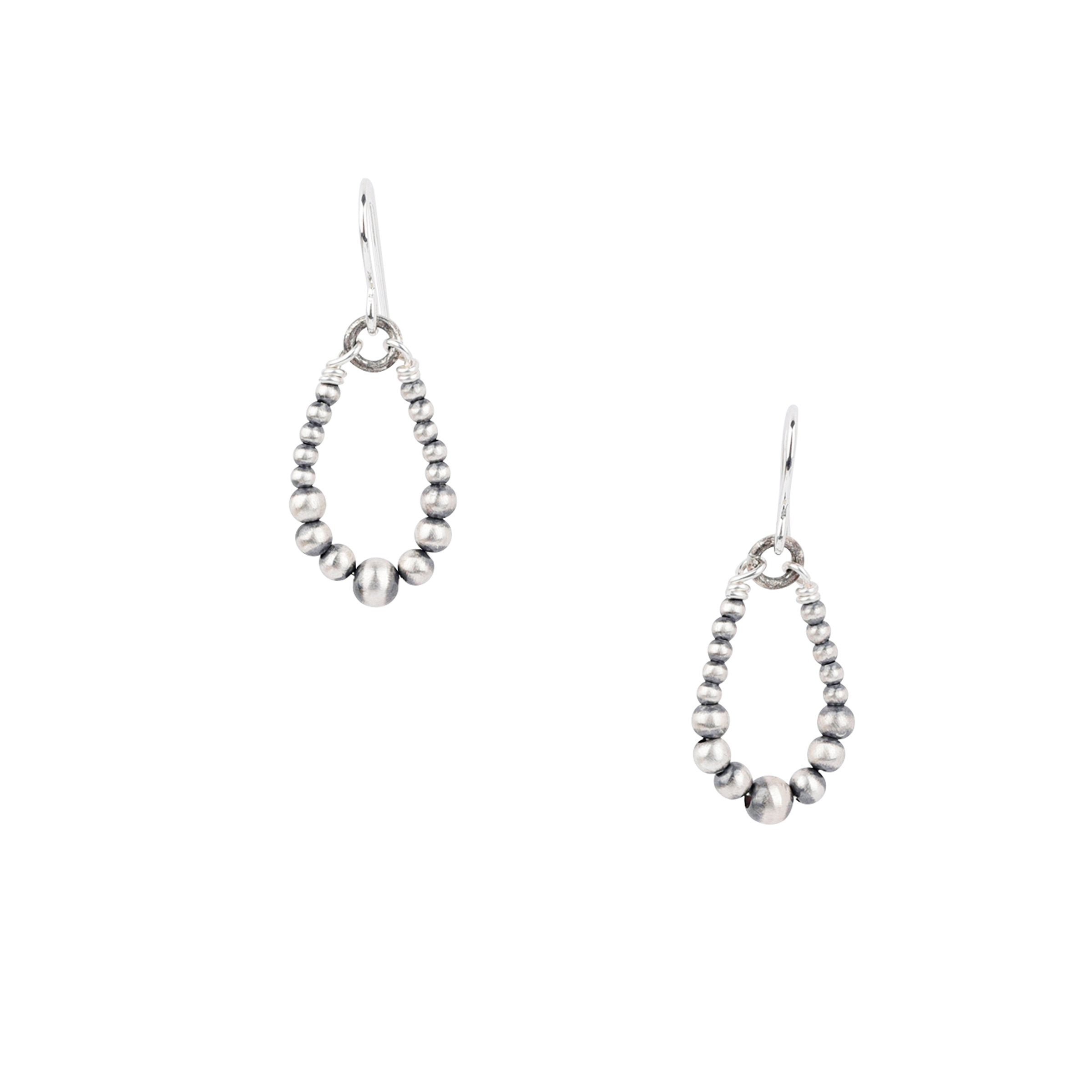 Sterling silver beaded dangle hoop earrings.