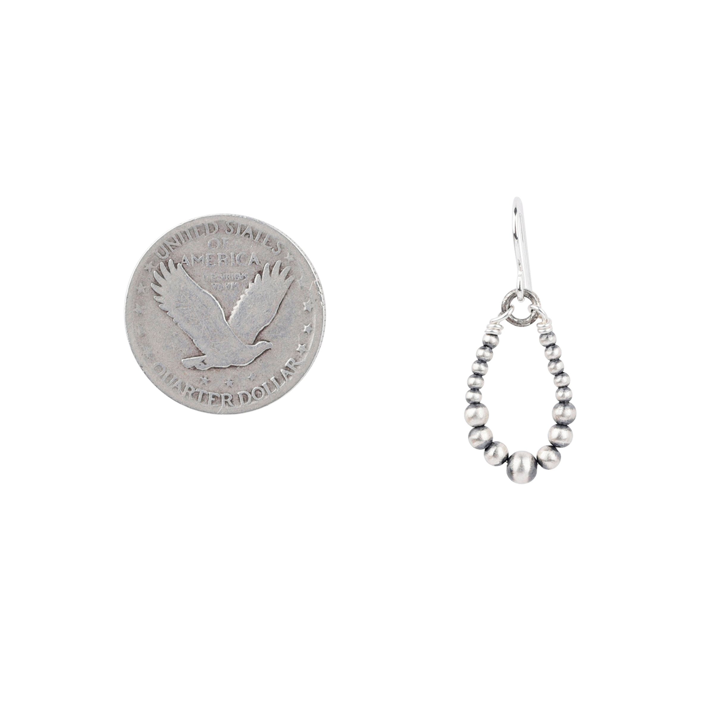Sterling silver beaded dangle hoop earrings.
