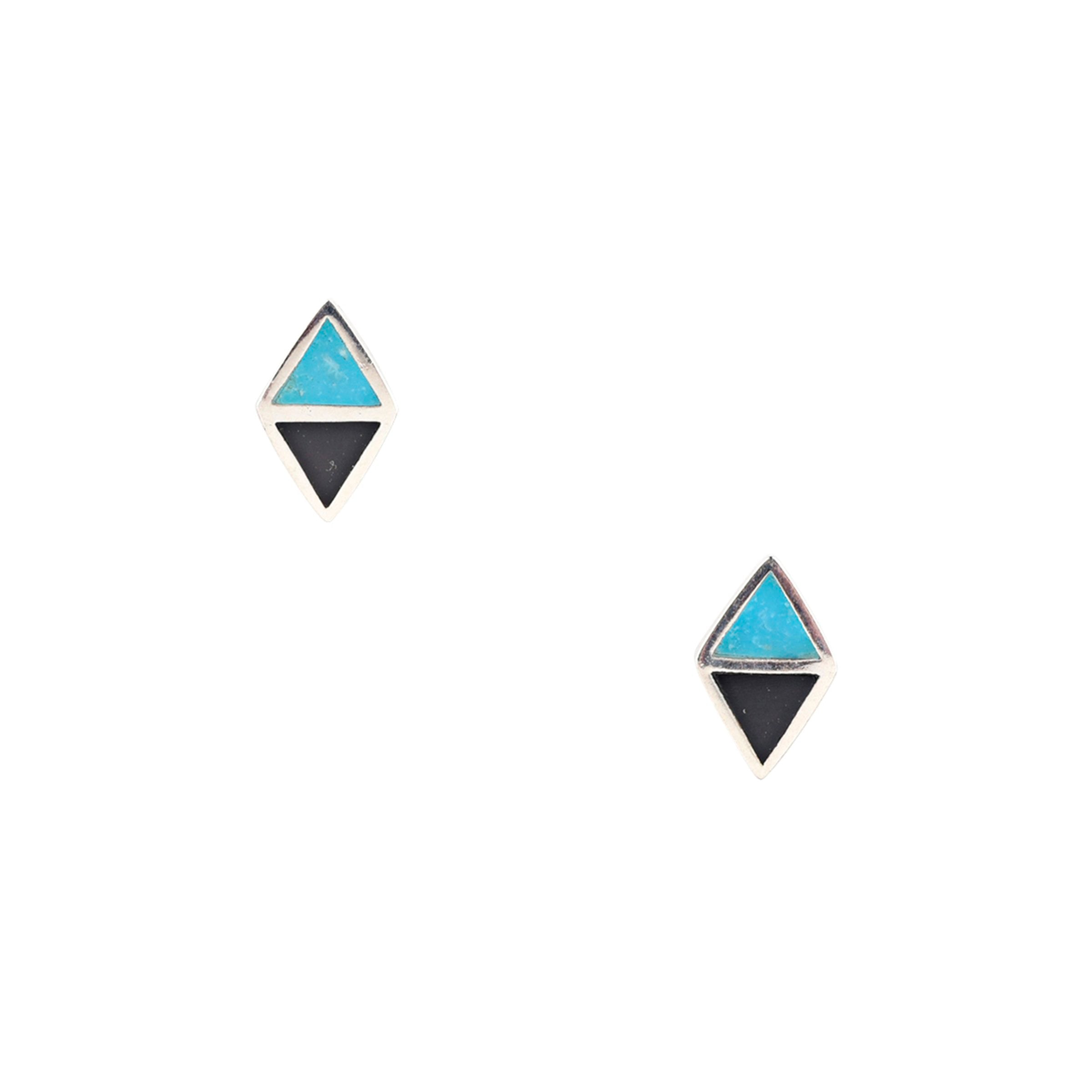 A pair of symmetrical sterling silver  earrings with blue turquoise and onyx stones from the Peyote Bird Bird and Arrow collection.